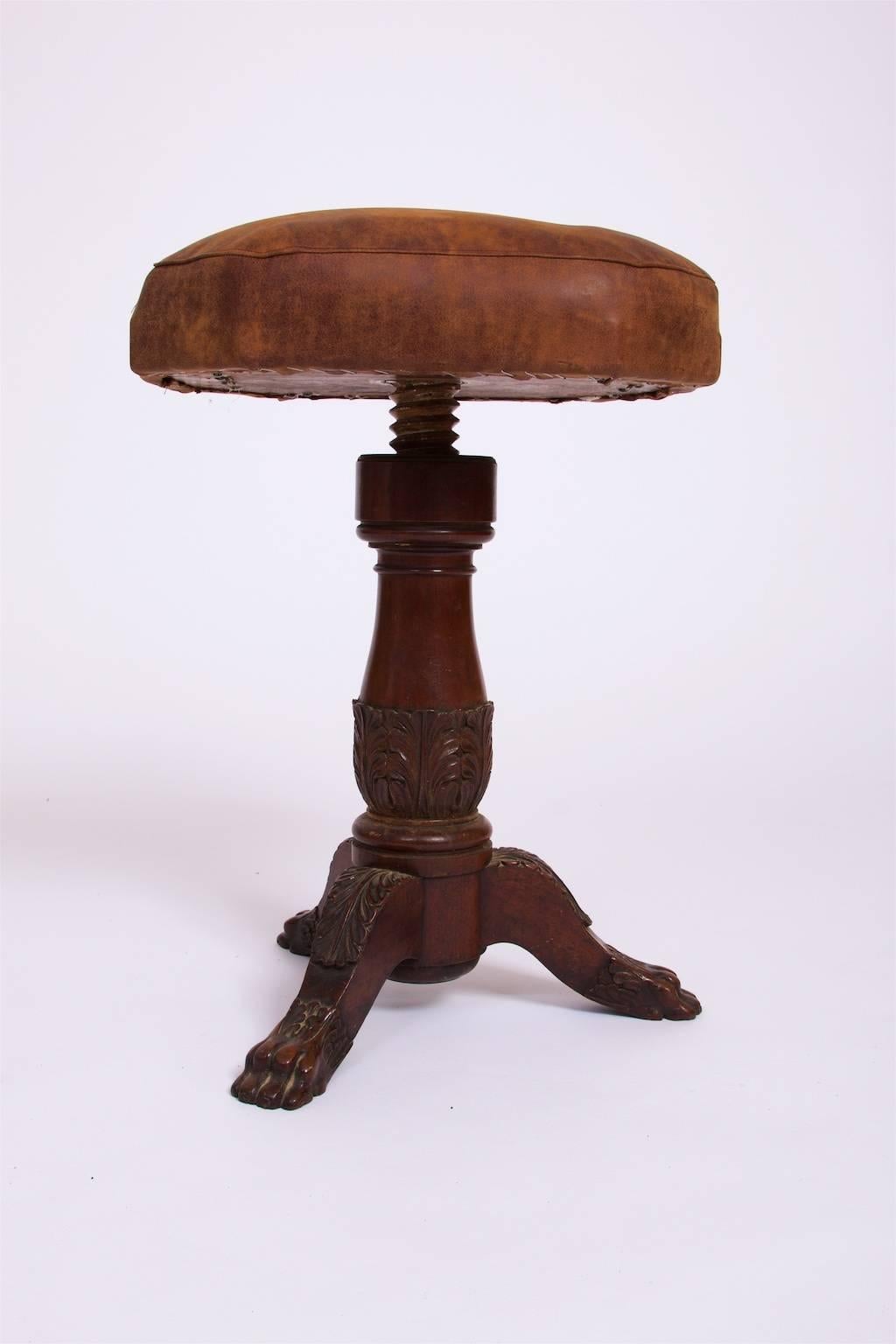 Swivelstool, Empire, circa 1820, mahogany with leather seat.