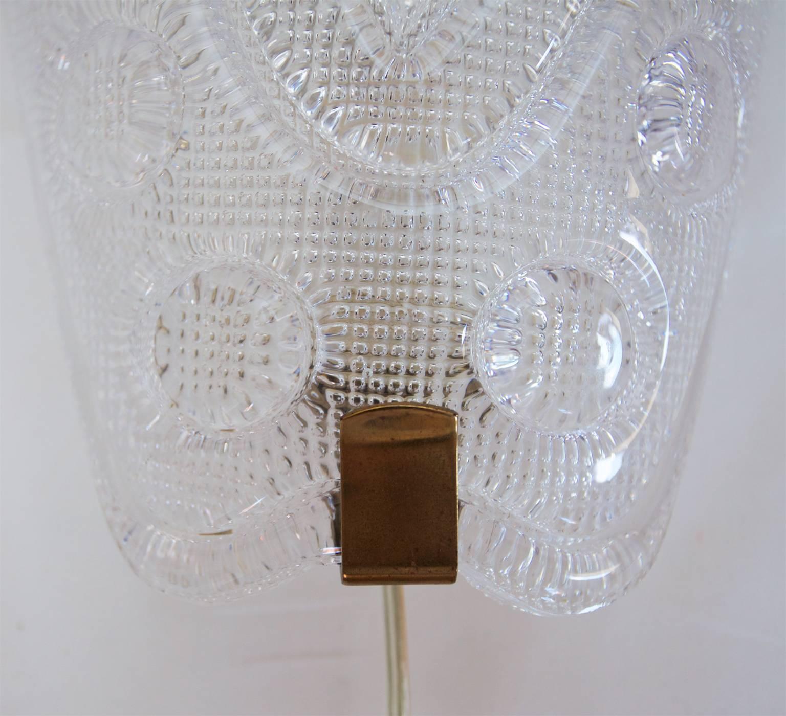Mid-20th Century Crystal Sconces with Raised Pattern by Carl Fagerlund for Orrefors, Sweden For Sale