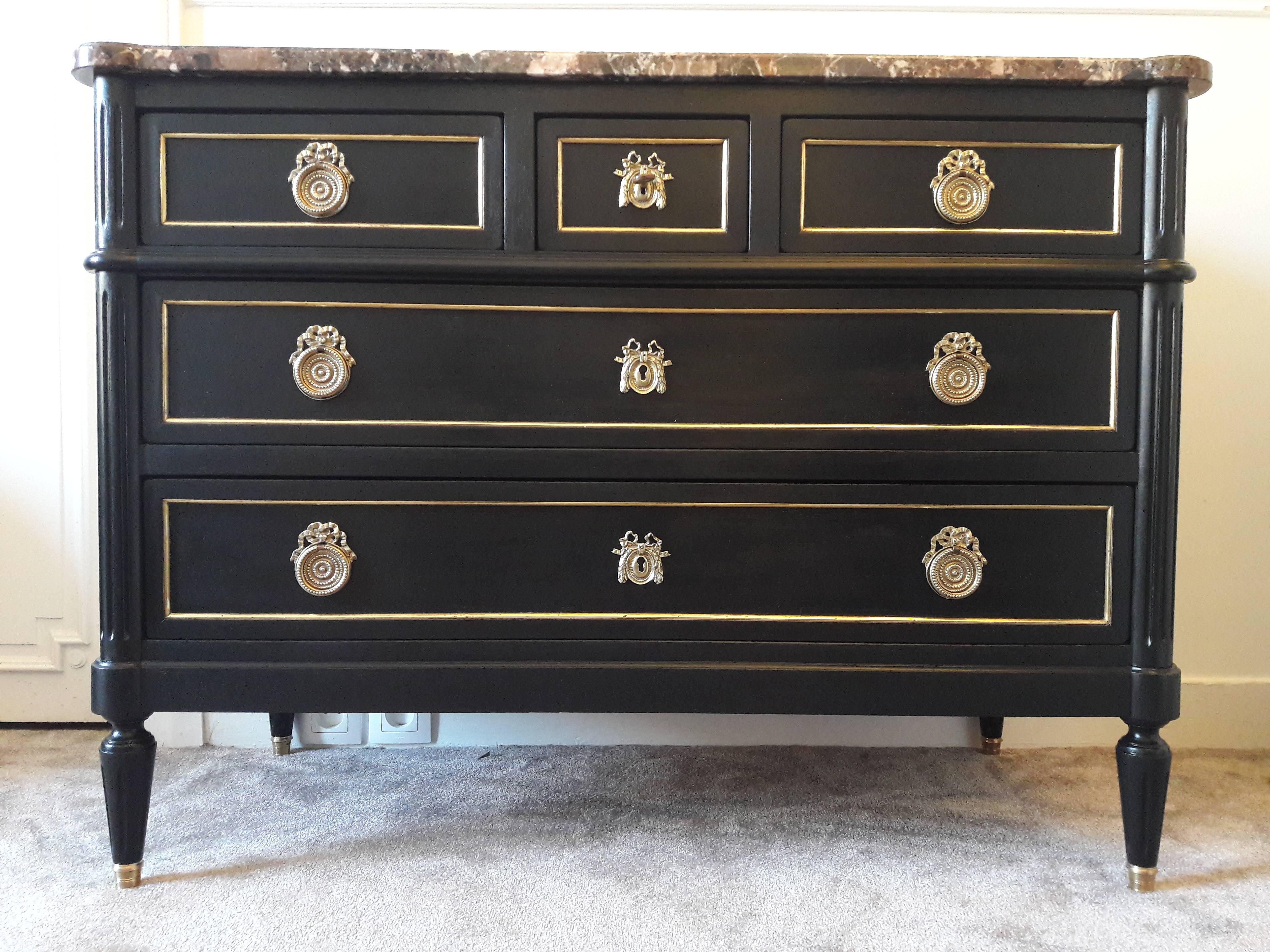 Antique French Louis XVI style chest of drawers topped with a rare and wonderful brown, grey, white and some copper touch marble, named Brèche Nouvelle and from France. Legs are fluted and finished with golden bronze clogs. Five dovetailed drawers