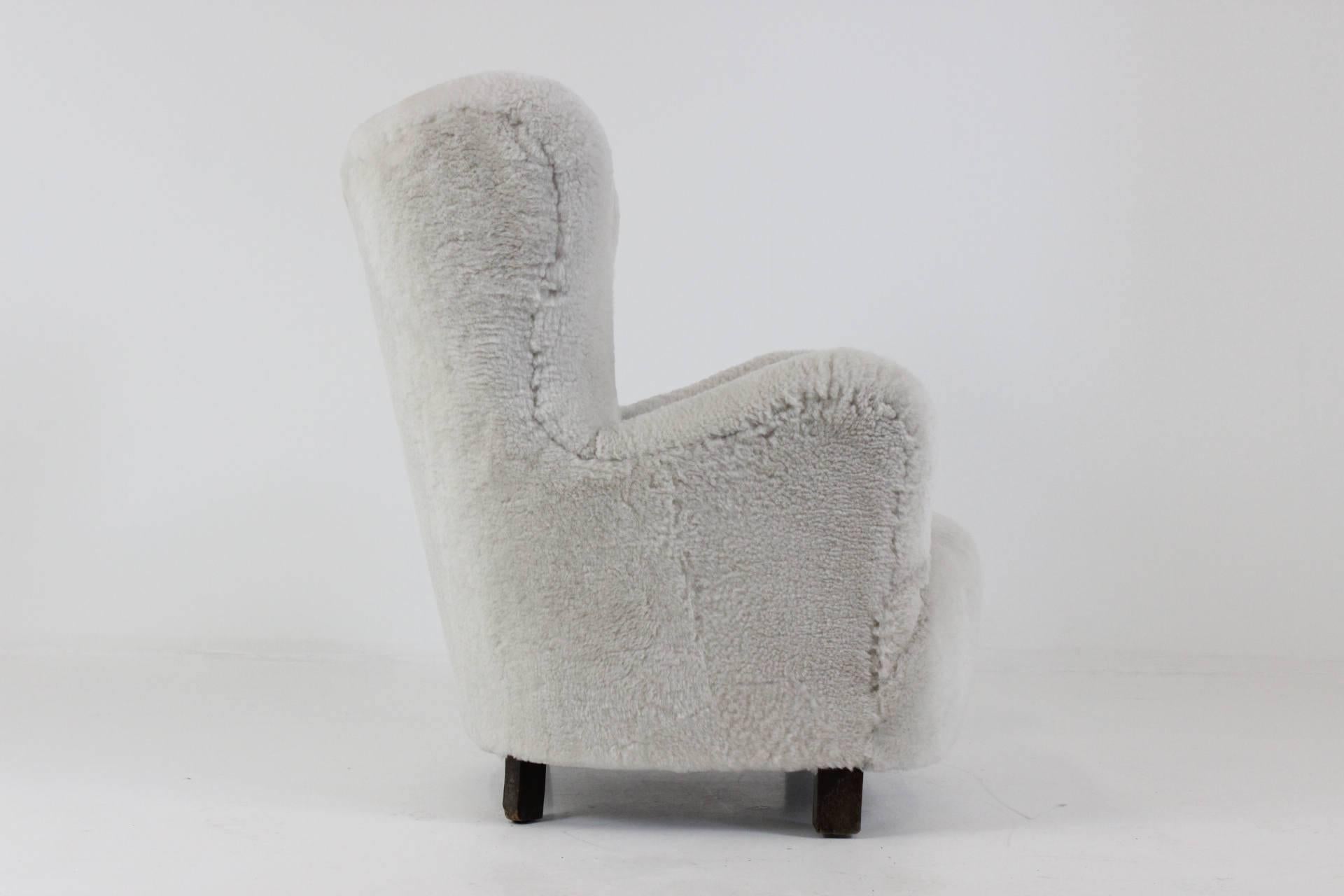 Estonian 1940s Danish Wingback Lounge Chair in Natural White Sheep Skin