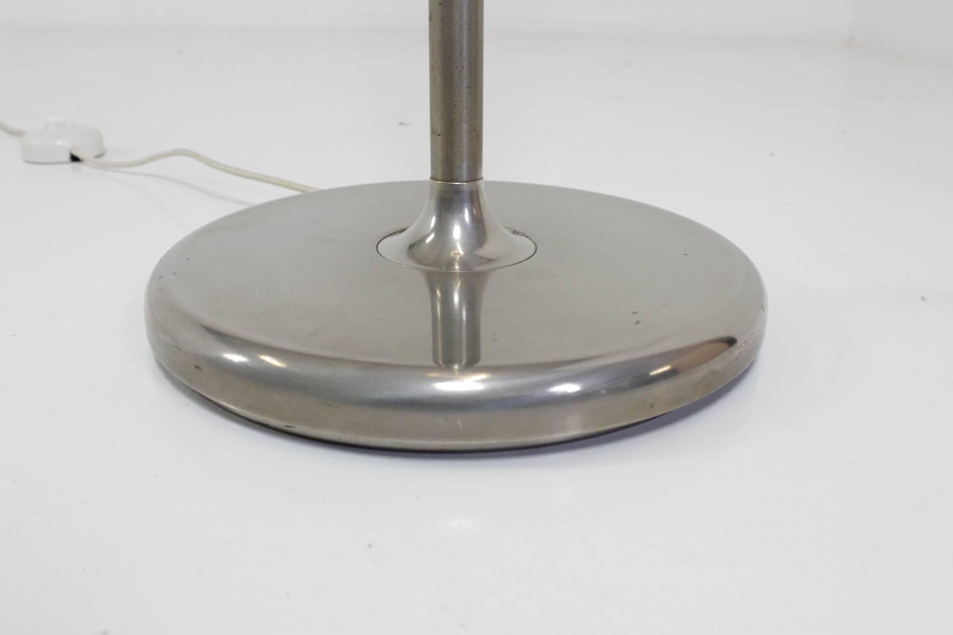 Chromed metal lamp with opaline glass in original and very good condition.