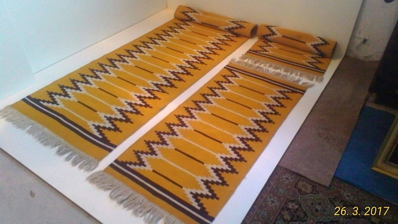 Reversible runners in Brussels style. A set of three reversible wool runners produced by Kelim, Czechoslovakia for Expo 58 Exhibition. Original very healthy condition. Measures: Three pieces 1x 370cm x 93cm, 2x 165cm x 72cm.