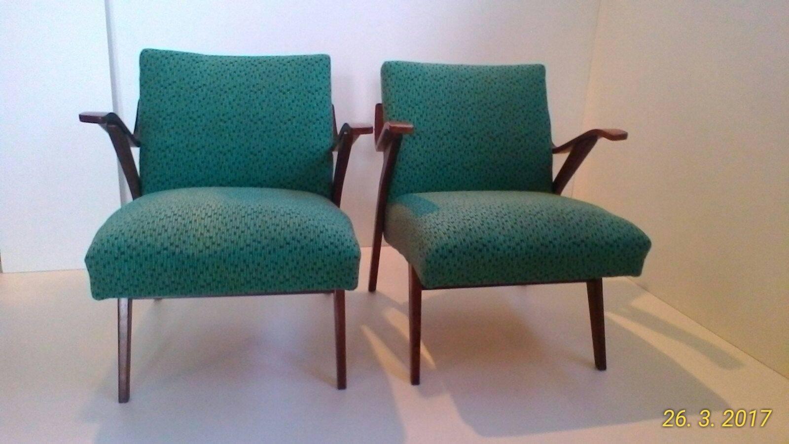 A pair of armchairs in Brussels style. The armchairs were produced by Tatra Pravenec, Czechoslovakia in 1960s during the famous 'Brussels era'. Very good original condition.
