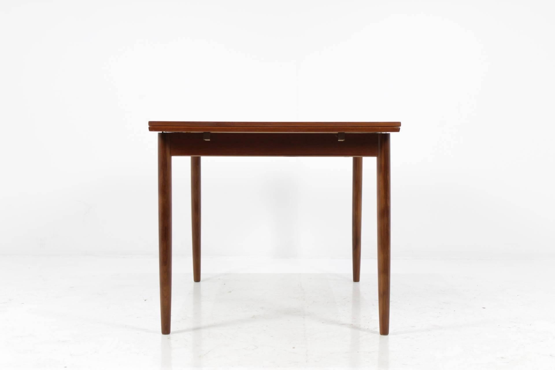 Danish teak extendable dining table made in circa 1960. Can be extended up to 230 cm. The item was carefully restored.