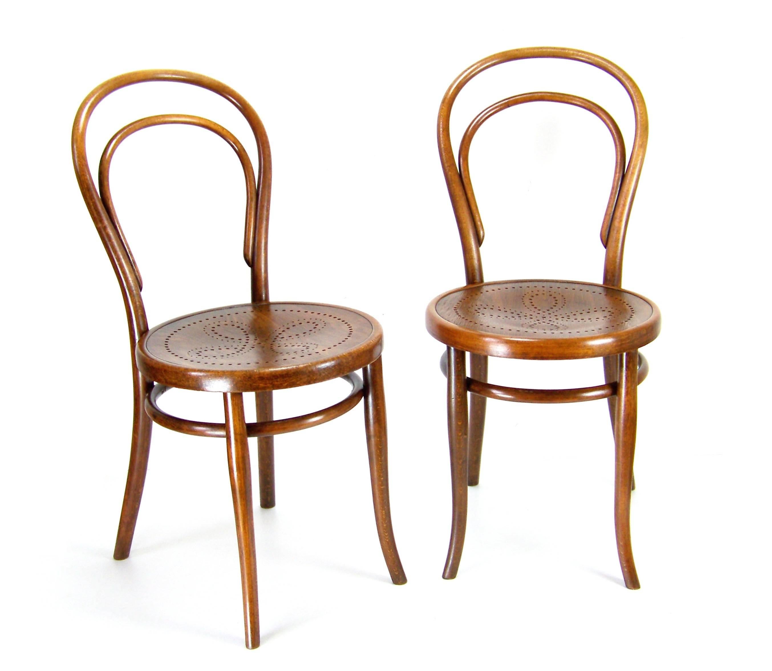 Manufactured in Austria by the Gebrüder Thonet company around year 1900. Bent beechwood. Original condition with minor signs of use. Chairs was cleaned and gentle re-polished with shellack finish. Tinny traces of woodworm (already inactive). Chair