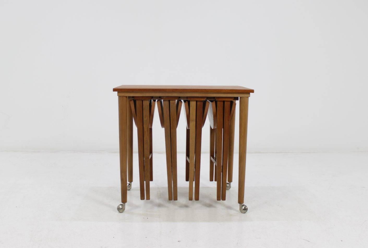 Set of five nest tables. Very practical. Wood professionally restored and revived.