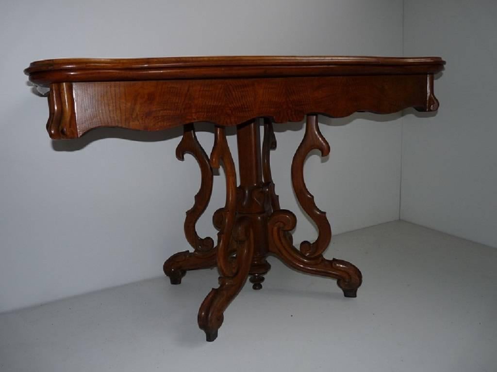 This 1860s antique French Louis Philippe style centre table is made of ashwood with a spectacular sculptured centre leg.

Measures: Fully extended 126 x 126 x 80 cm.