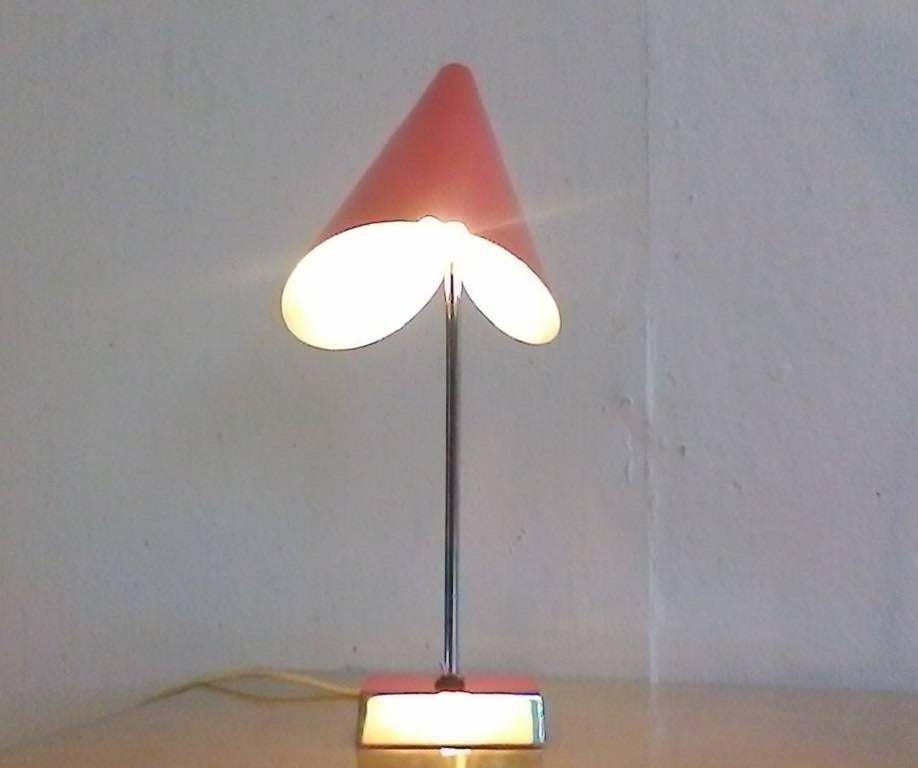 Napako produced this Mid-Century red table lamp in 1960. It is made out of steel and was designed by Josef Hurka.  Adjustable lamp inclination. Very good original condition.