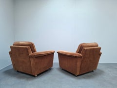 Pair of Mid-Century Modern Czech Lounge Armchairs with Rolling Casters