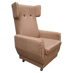 Mid-Century Modern Wingback Lounge Armchair on Castors in Original Upholstery