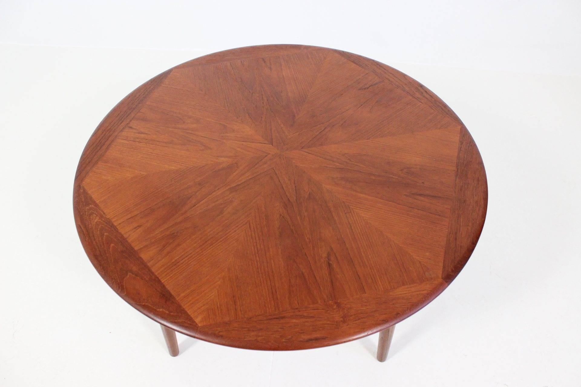 Geometric pattern round coffee table in teak by H.W. Klein for Bramin Møbler. Carefully restored.
