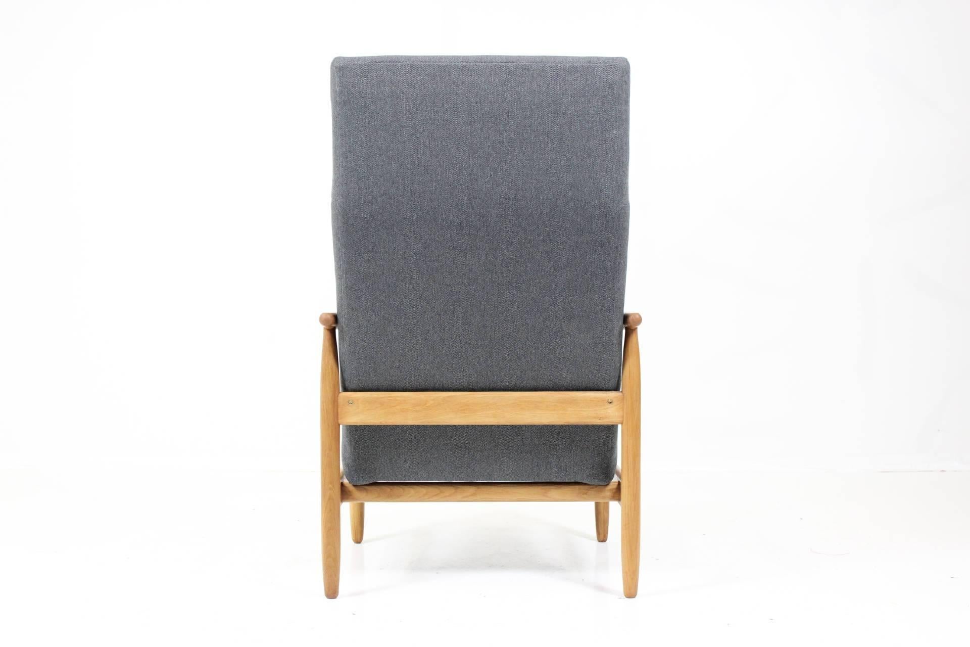 Mid-20th Century Ejvind A. Johansson High Back Armchair with Stool for FDB Møbler