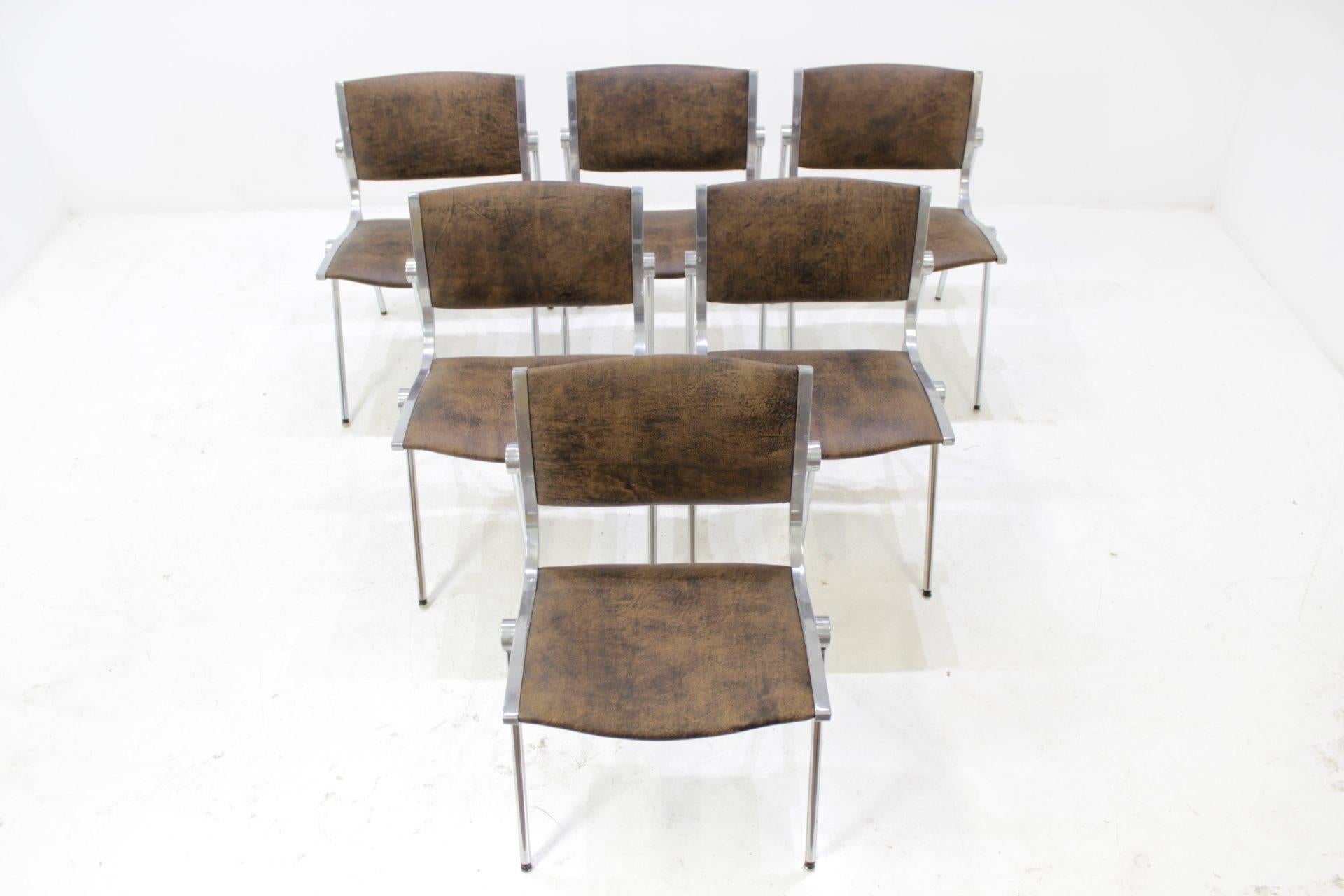 This set of rare aluminium dining chairs were produced in 1960s in Italy by 