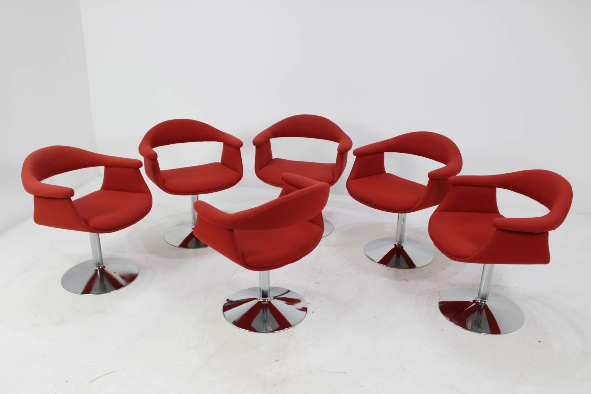 This rare set of swivel chairs in original condition were produced in Finland in 1960s. Model: Forelli 8565 (1966), the original wool upholstery shows some signs of wear due to age. One of the chair had hole on armrest upholstery .This was fixed