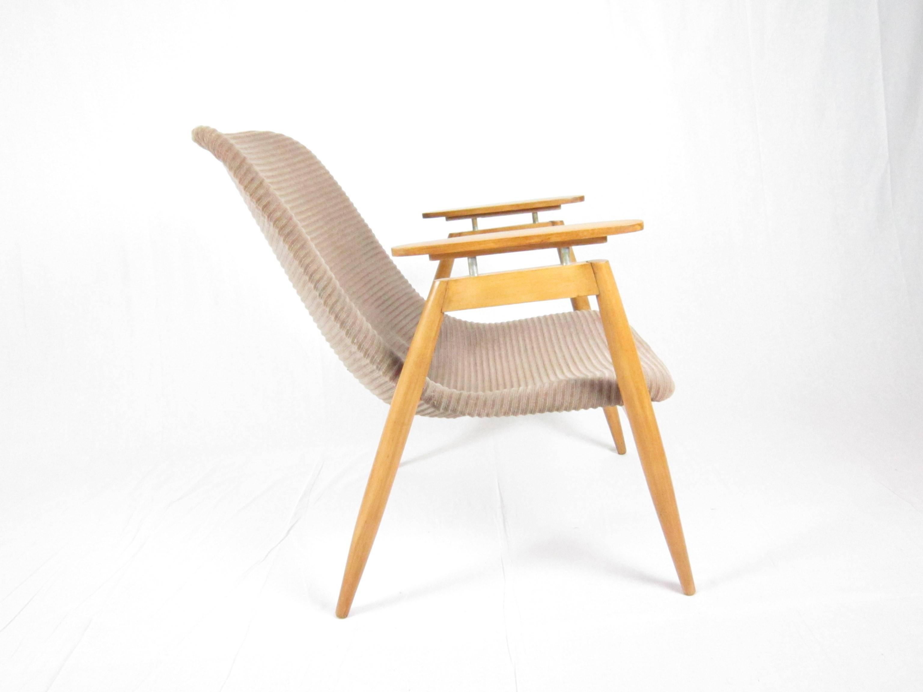 Miroslav Navratil armchair made in Czech Republic, circa 1950.
The item is in good original condition included fabric upholstery.
 