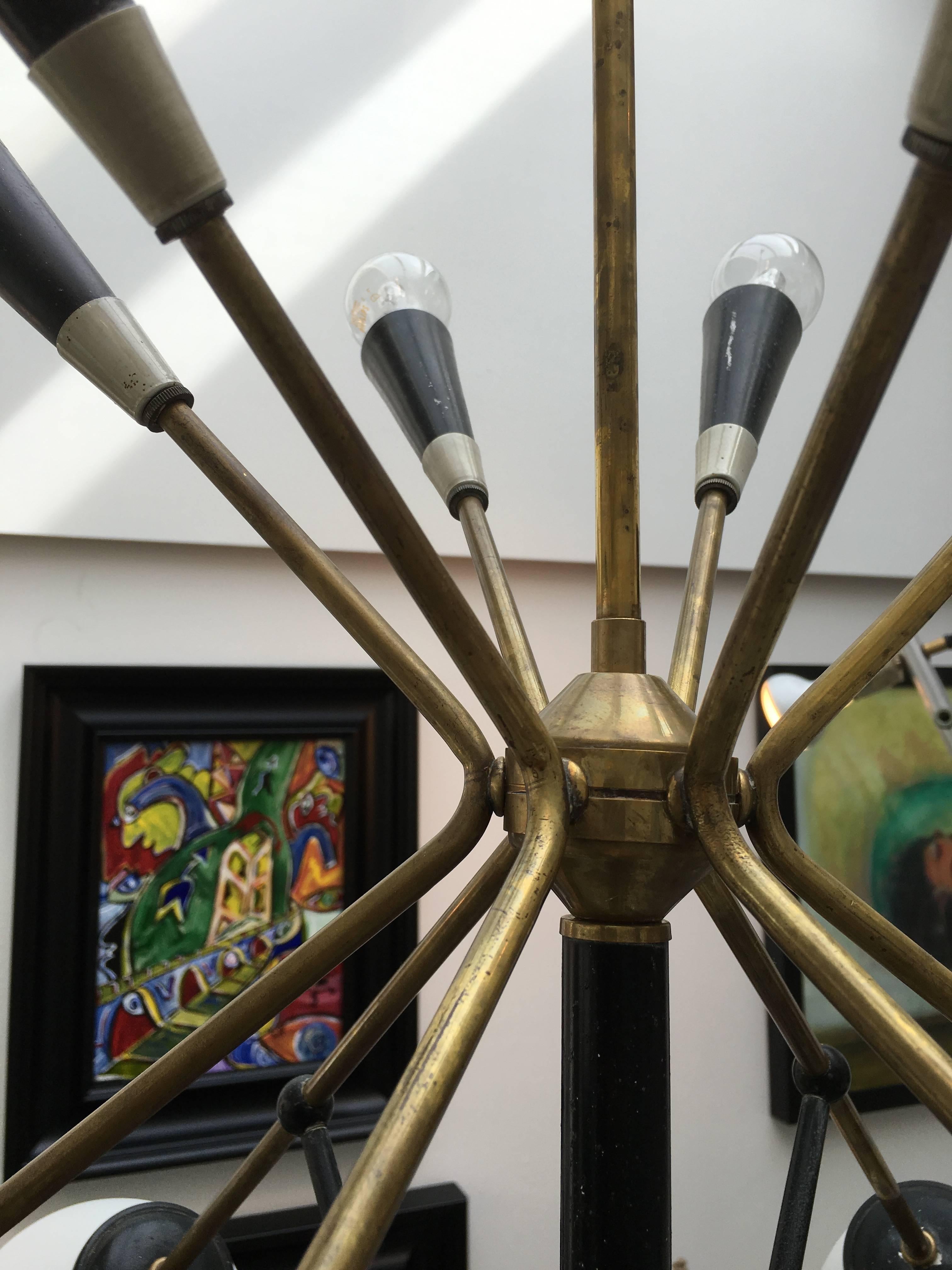 This is a super Stilnovo 1950s chandelier in original unrestored condition. 

Brass and painted black structure, superbly made and perfect either to keep it original as it is, or to restore to as new.



        