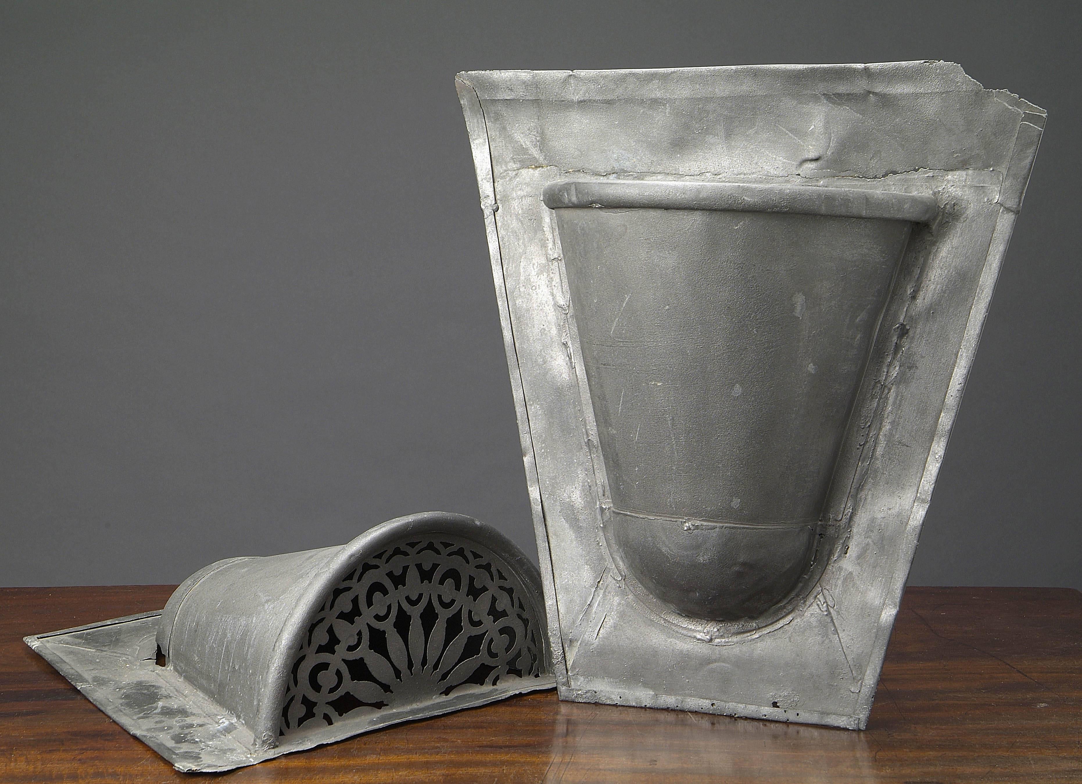 Rare pair of zinc ventilation apertures - ( in French chatières) cone shaped on trapezoid background - 
France, 19th century 
Dimensions: w.46 X d.14 X h.49 cm