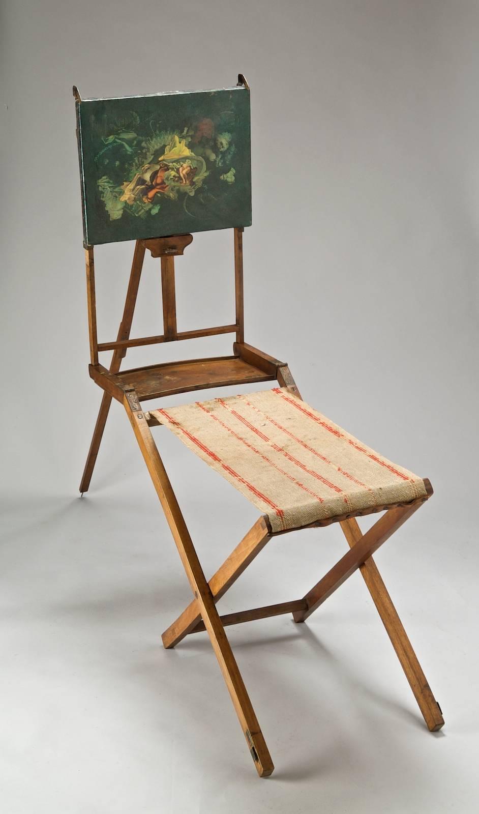 Rare small easel used for outside folding, portable, with a burlape seat, France, 19th century 
Dimensions: Folded height: 68 cm, height deployed: 120cm - seat 56 X 34 X H 46.
 