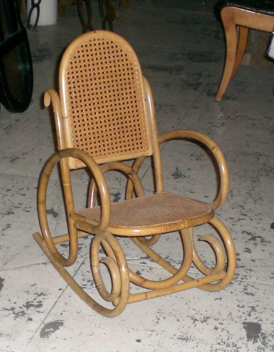 Rare pair of small rocking chairs for children - seat and back caned - 
by the very famous cabinetmaker Michael Thonet. 
Germany, XIXth century 
Dimensions: l.36 X p.55 X h.66 cm