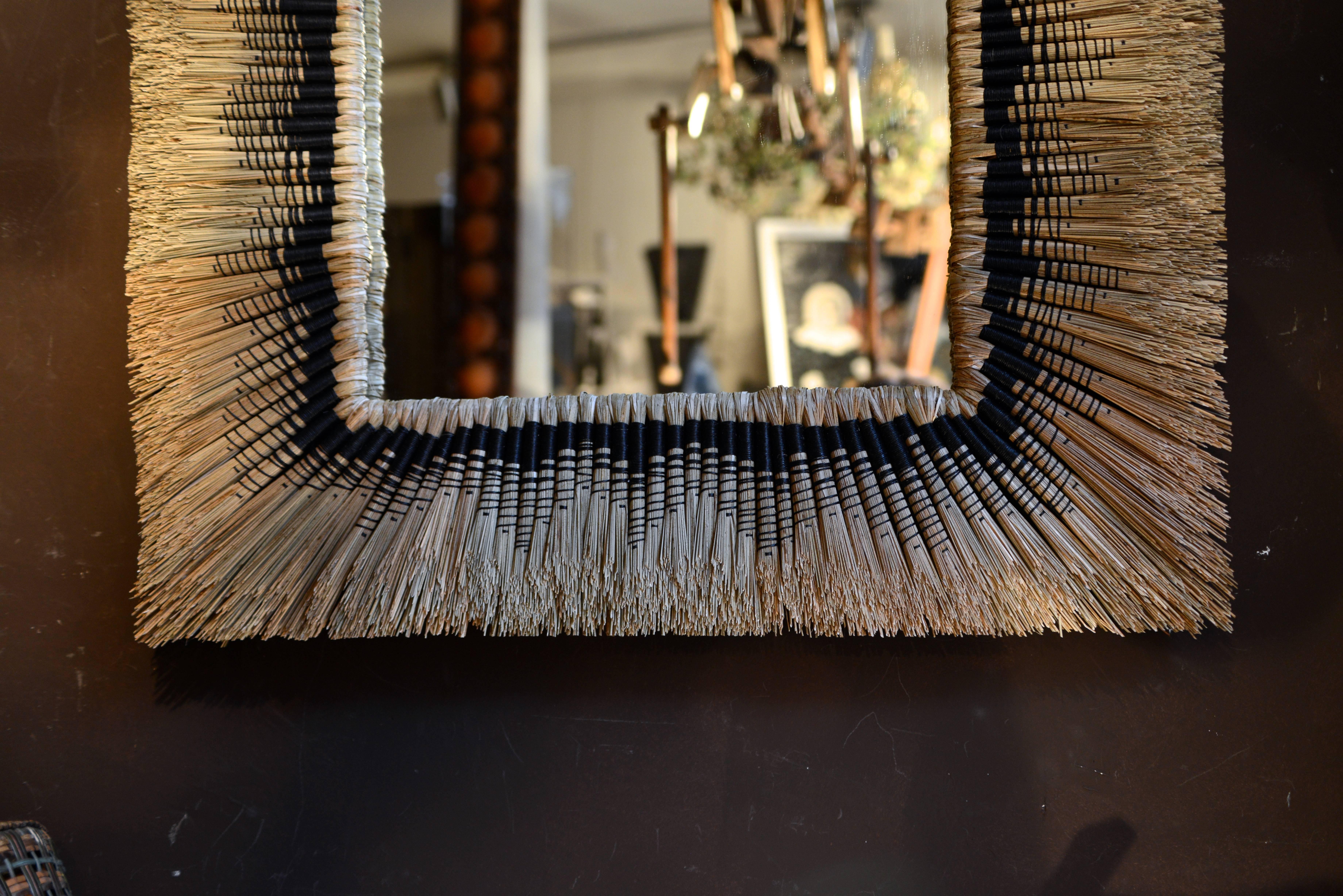 Very atypical straw frame mirror in raffia and braiding, in the spirit of the 1940s - Rare work.
France, contemporary work.
Dimensions: 5 X 79 X 101 cm 
Mirror dimensions: 42 X 67 cm 
