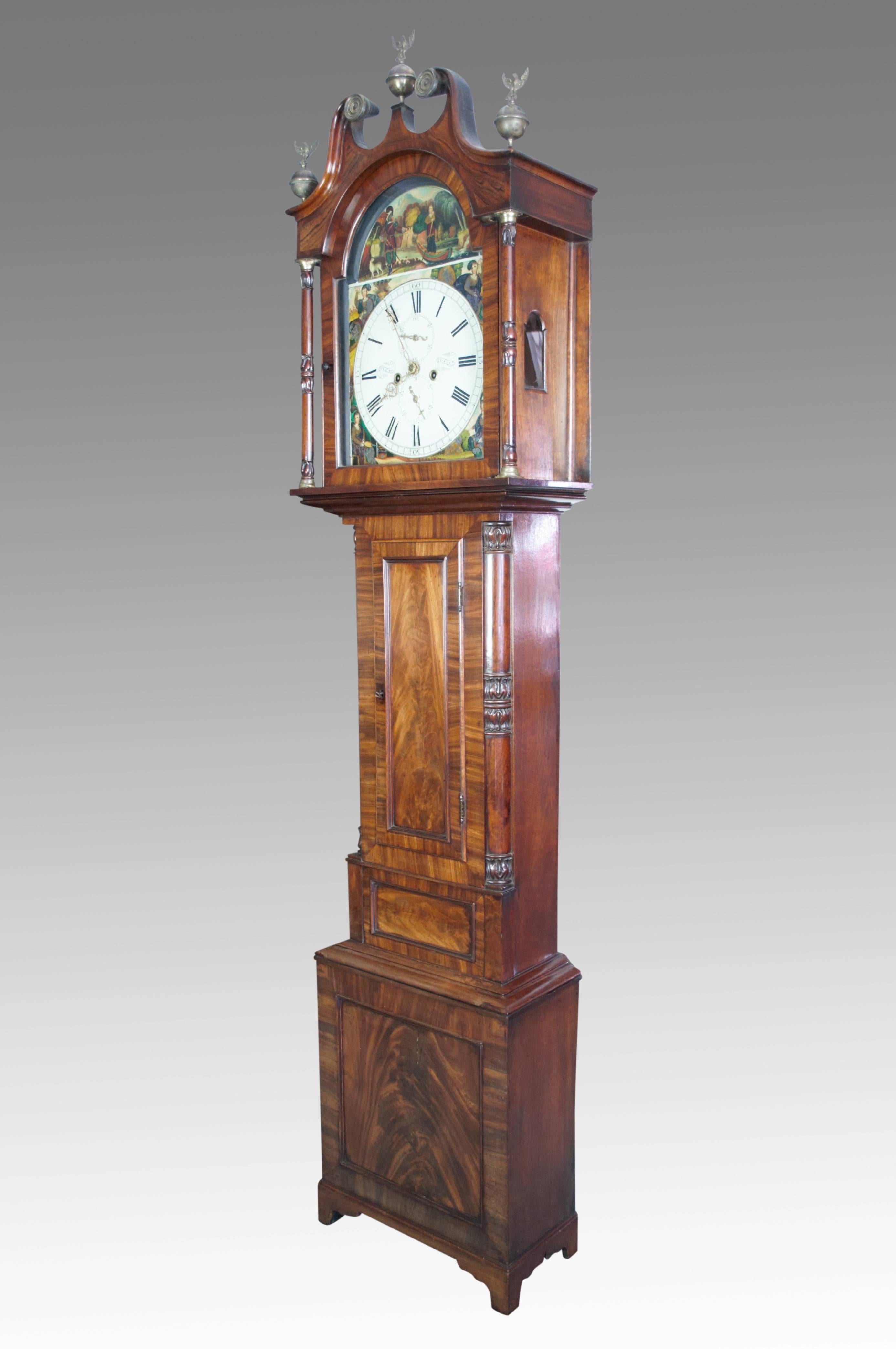 A high quality mahogany Scottish longcase clock by William Young of Dundee, with 8 day movement and hourly strike. The arched painted dial with Roman numerals, a seconds dial and date dial. Painted in each corner with scenes of the Four Seasons and