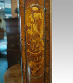 Dutch marquetry walnut cushion mirror with crest