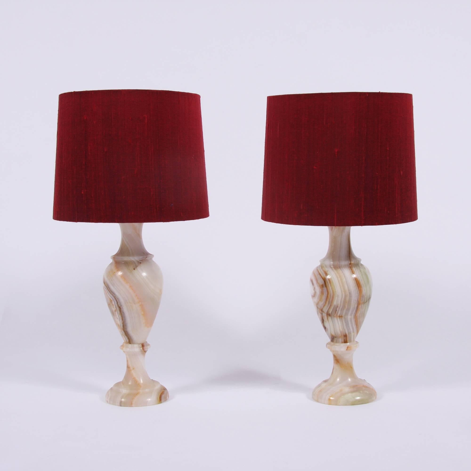 A pair of elegant, French Mid-20th century, urn shaped alabaster table lamps. The alabaster has lovely warm veining through it.
In excellent condition.
Pictured with bespoke silk handmade shades. Height is to the top of the shade.
Rewired and PAT