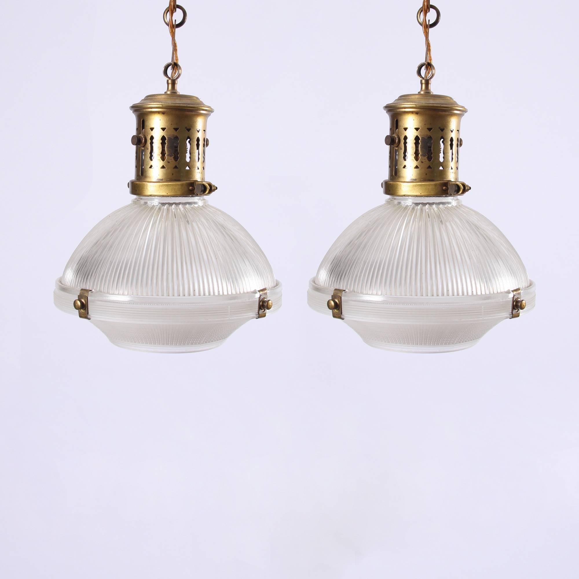 English, mid-20th century

Pair of Holophane lamps with perforated brass gallery. Rewired and PAT tested.