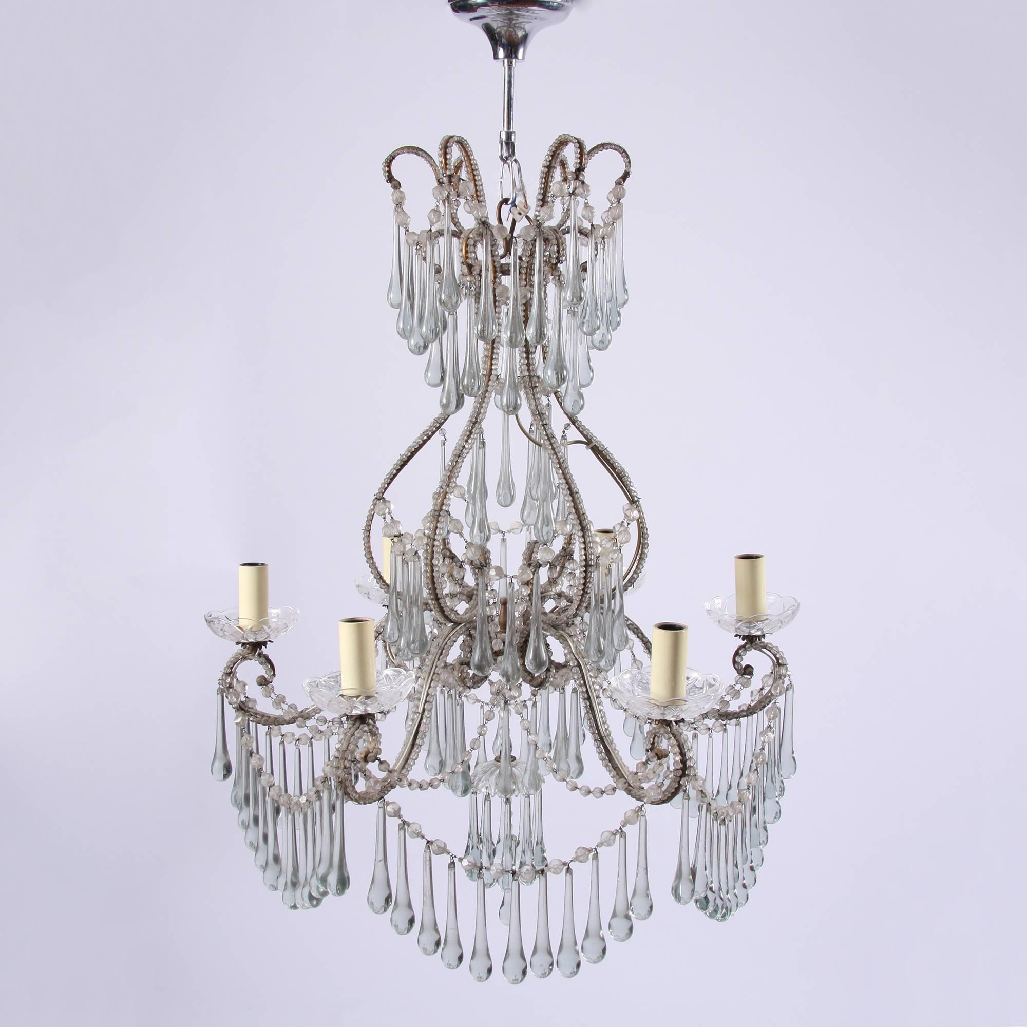 Italian, early 20th century

Italian beaded chandelier with light blue tear drops. Six arms. Rewired and PAT tested.