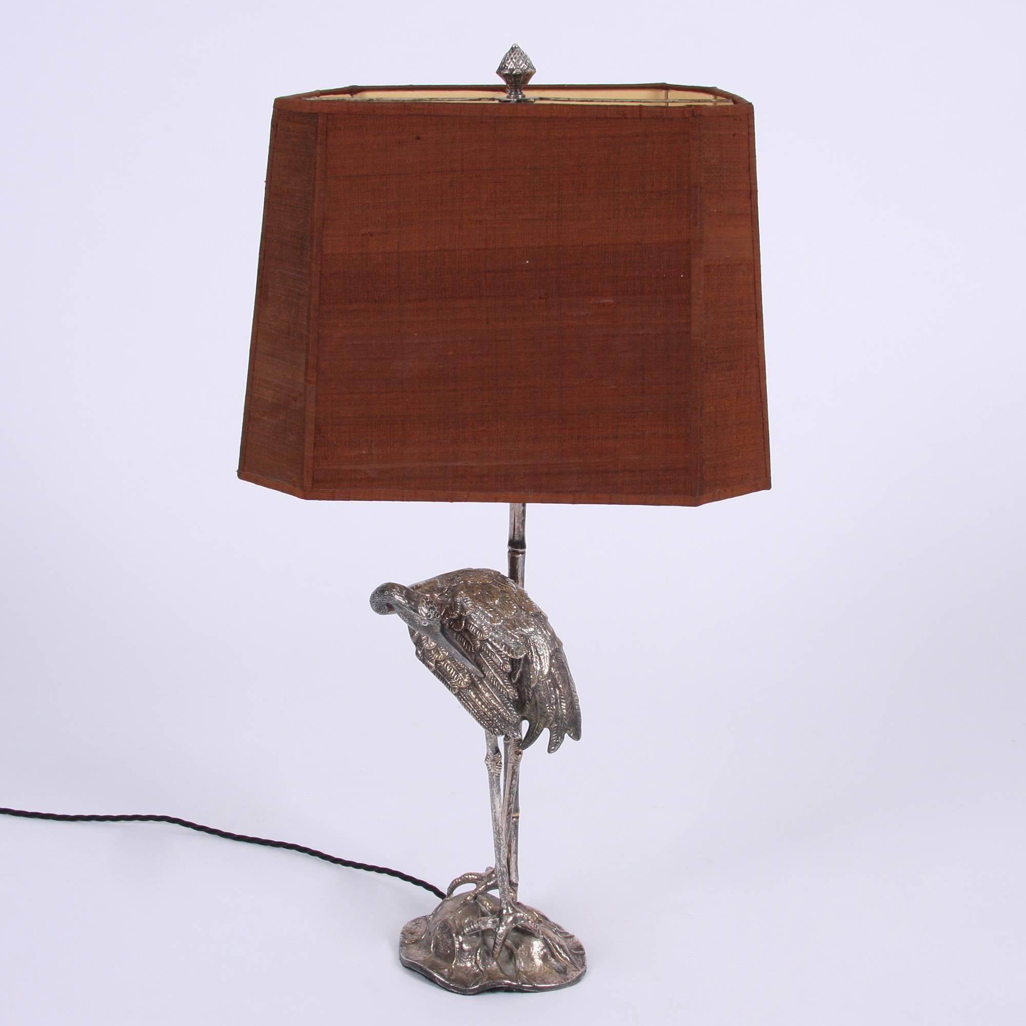 Spanish c.1960

Stunning table lamp with bamboo column and stork. Silver plated. Shown with original shade. Rewired and PAT tested. 