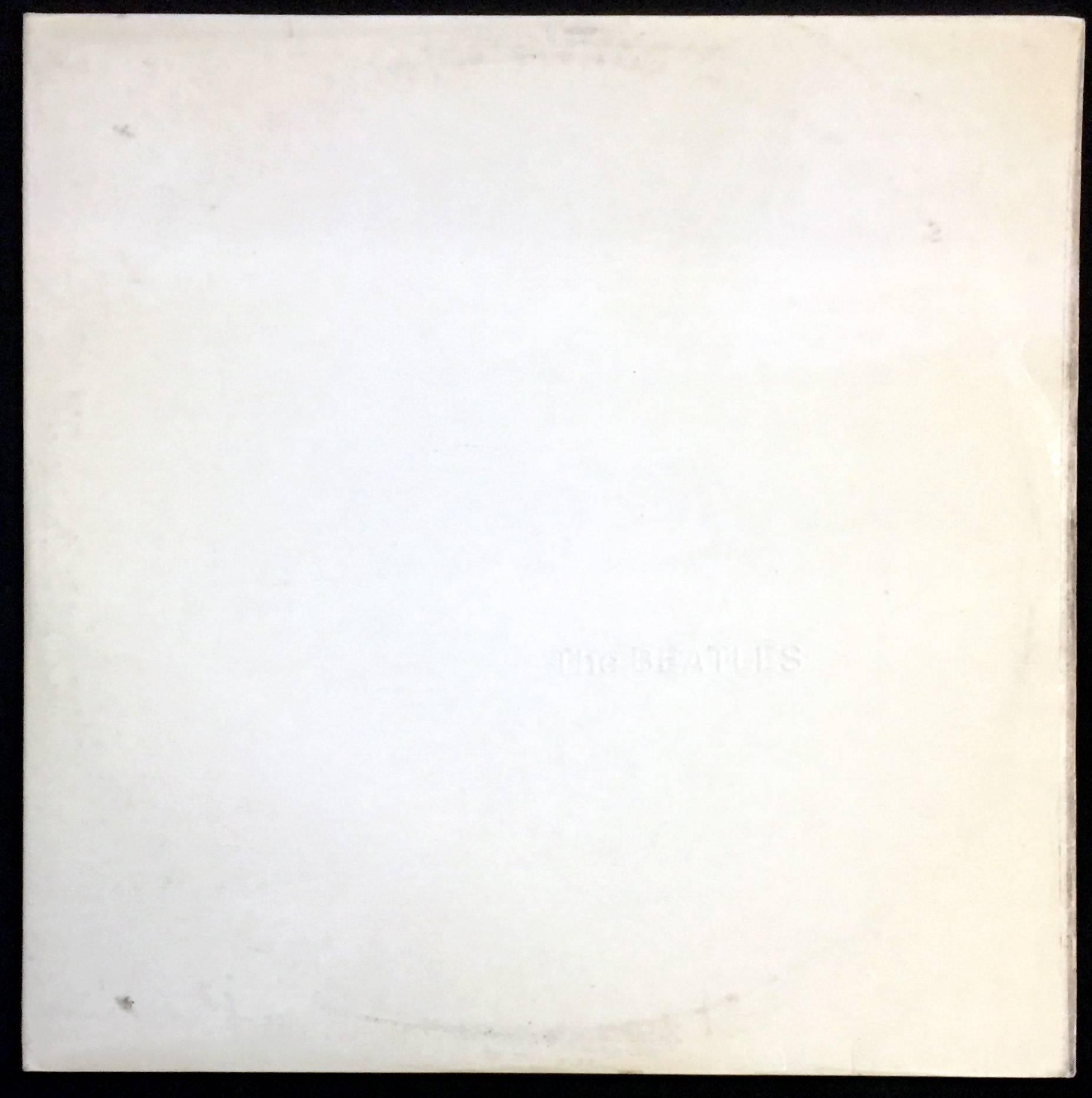 A rare sought after, 1978 UK, special White Vinyl Apple pressing of The Beatles famed White Album. Includes full set of posters as pictured. 

Vinyl: All four records are in excellent condition and free of any visible scratches.
Cover: signs of