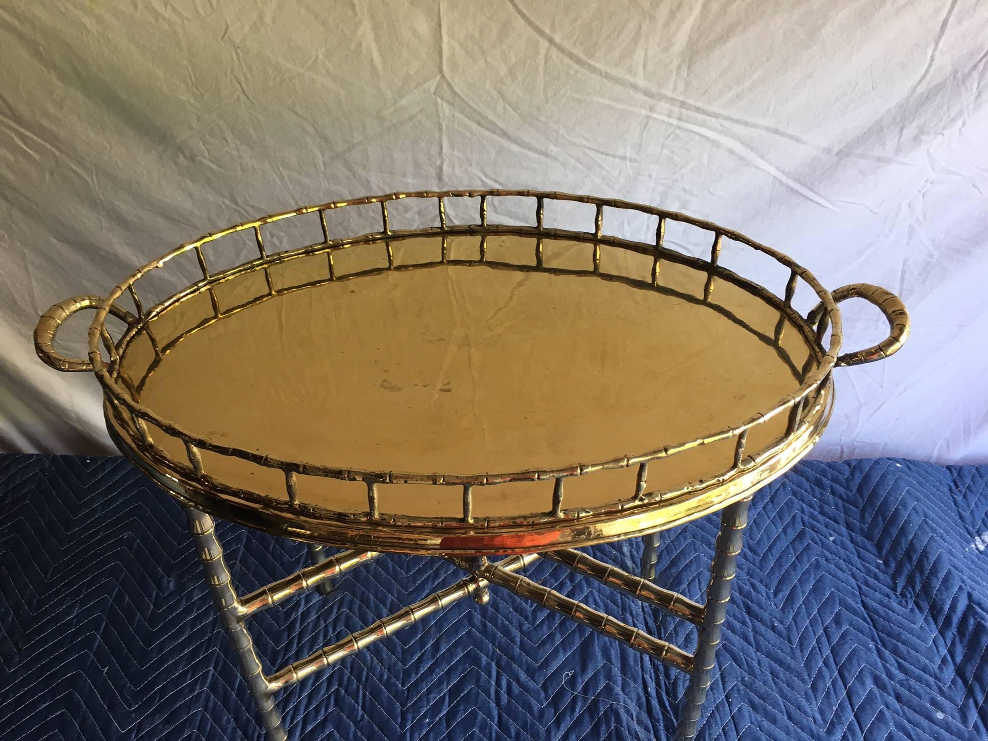 Beautiful brass oval faux bamboo tray table. In excellent condition and newly polished, circa 1960.