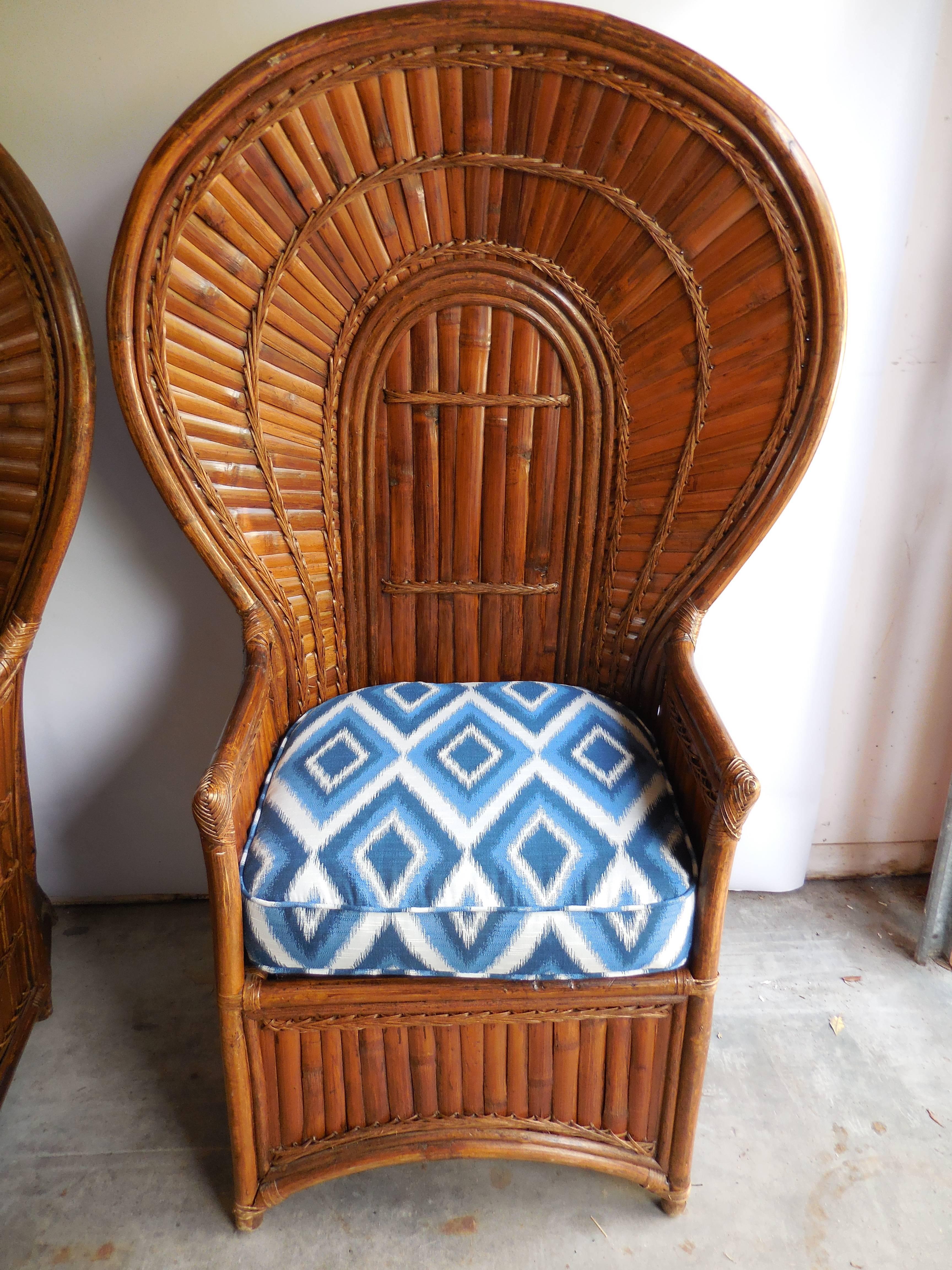 Pair of bamboo Peacock chairs, circa 1960. Both chairs have a hidden storage compartment, perfect for blankets, towels or pillows. In excellent condition.