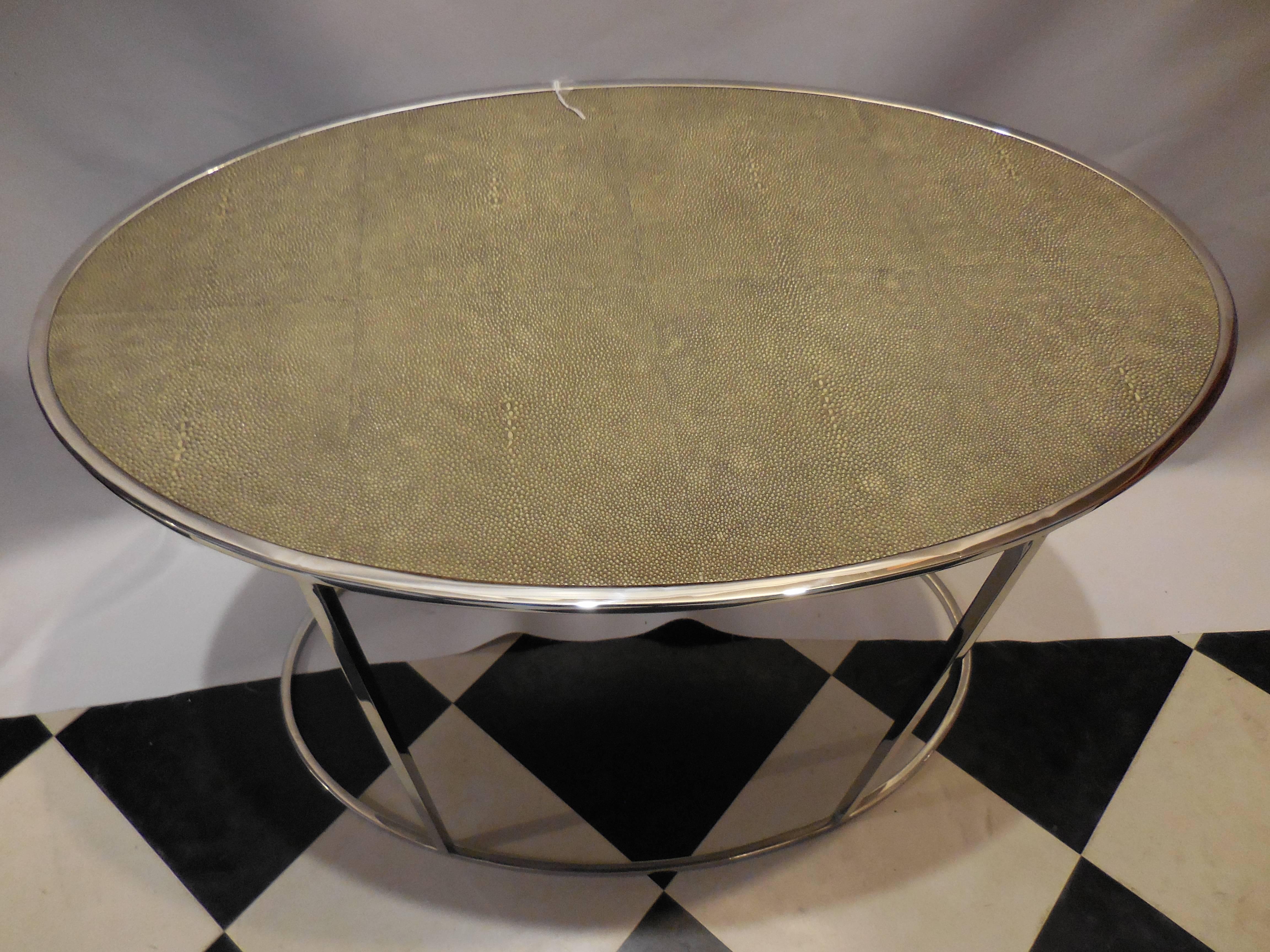 Modern oval Theodore Alexander shagreen top table. In excellent condition, circa 1999. Founded in 1996 by the enigmatic Paul Maitland Smith, an industry legend who has pioneered high end furniture production throughout Asia for the past 25 years,