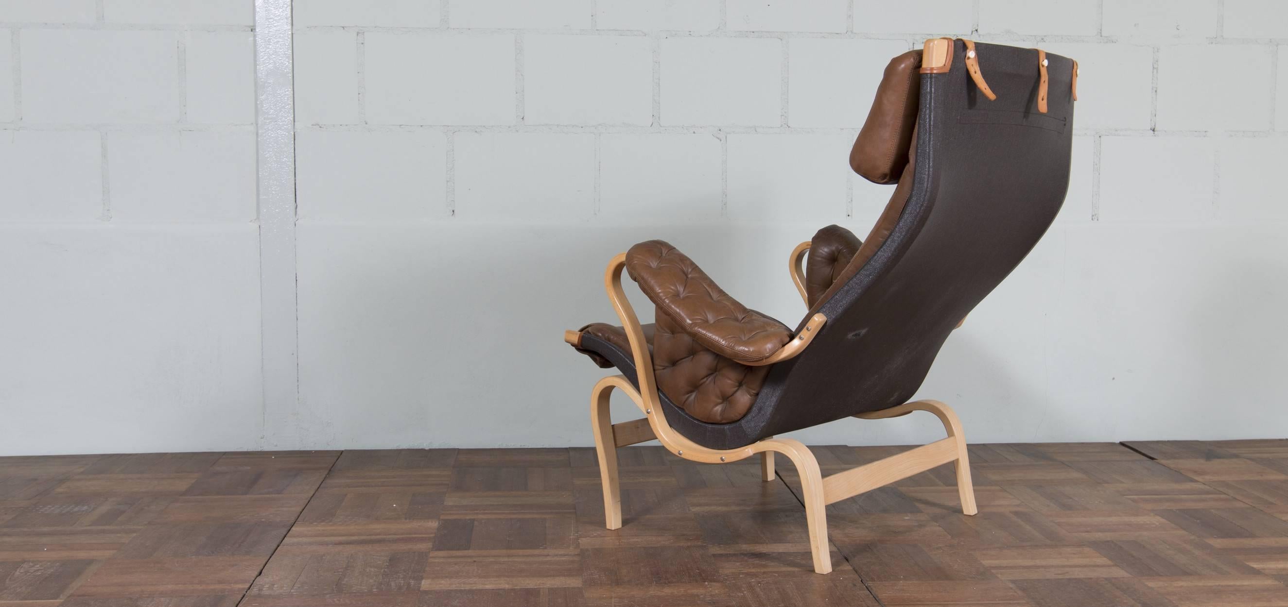 Bruno Mathsson Pernilla lounge chair produced by DUX, DUX is a company located in Sweden. The Pernilla lounge chair designed by Bruno Mathsson in 1969.

Bruno Matthson designed the Pernilla chair originally in 1944. DUX’s Perinilla is Bruno’s