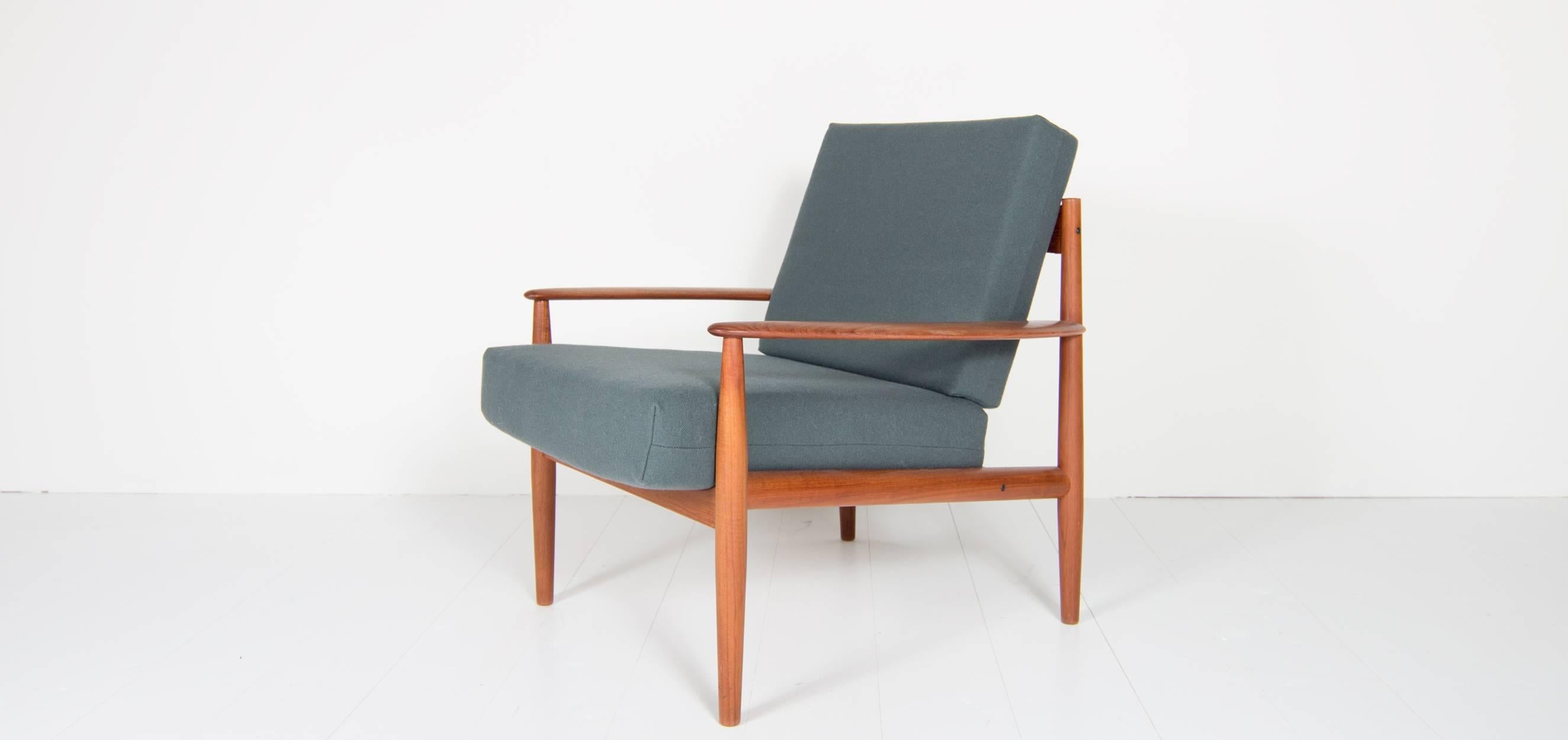 Grete Jalk chair model 118 produced by France and Son in Denmark. This Grete Jalk chair is new upholstered in grey fabric by Kvadrat; Tonus 4.
The chair is great designed in high end quality. Please look at the photos to see the great details. This