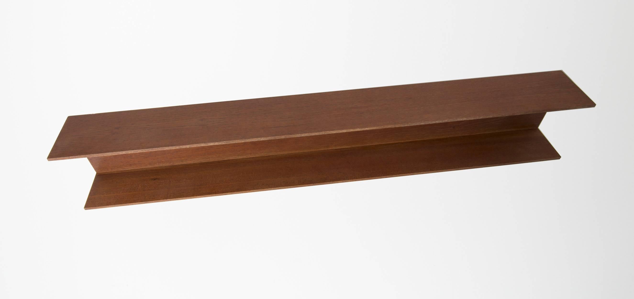 Walter Wirz wall shelf produced in 1965. This wall shelf is designed by Walter Wirz for the German company Wilhelm Renz.

Wilhelm Renz took over the company in 1902 that Otto Vetter had started in the early 80s. More than 10 years later, Wilhelm