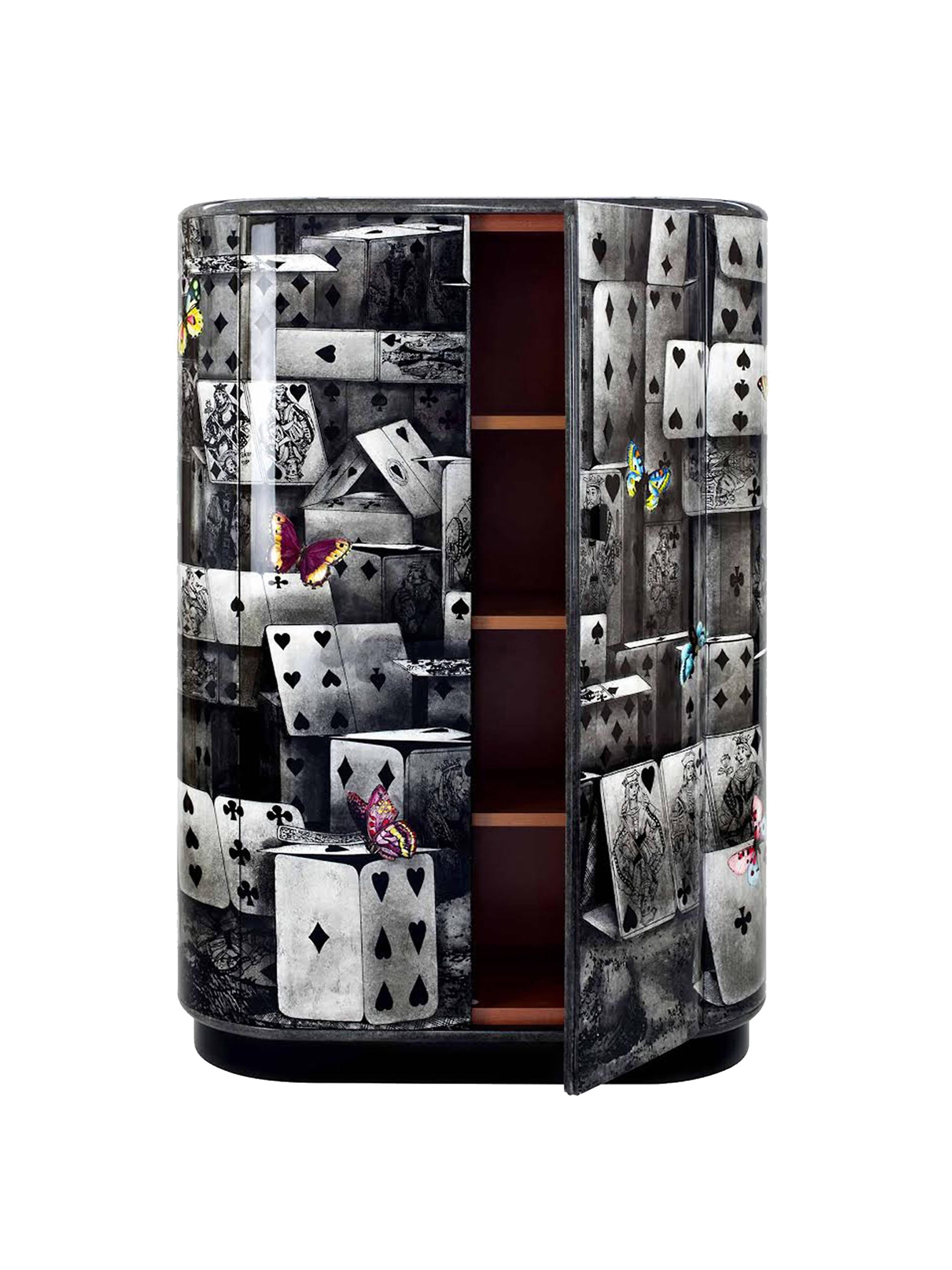 This curved cabinet has a lithographically applied graphic which is hand-finished and covered with a smooth lacquer.

The Italian painter, sculptor, craftsman, and decorator Piero Fornasetti cultivated a highly original style throughout his career.