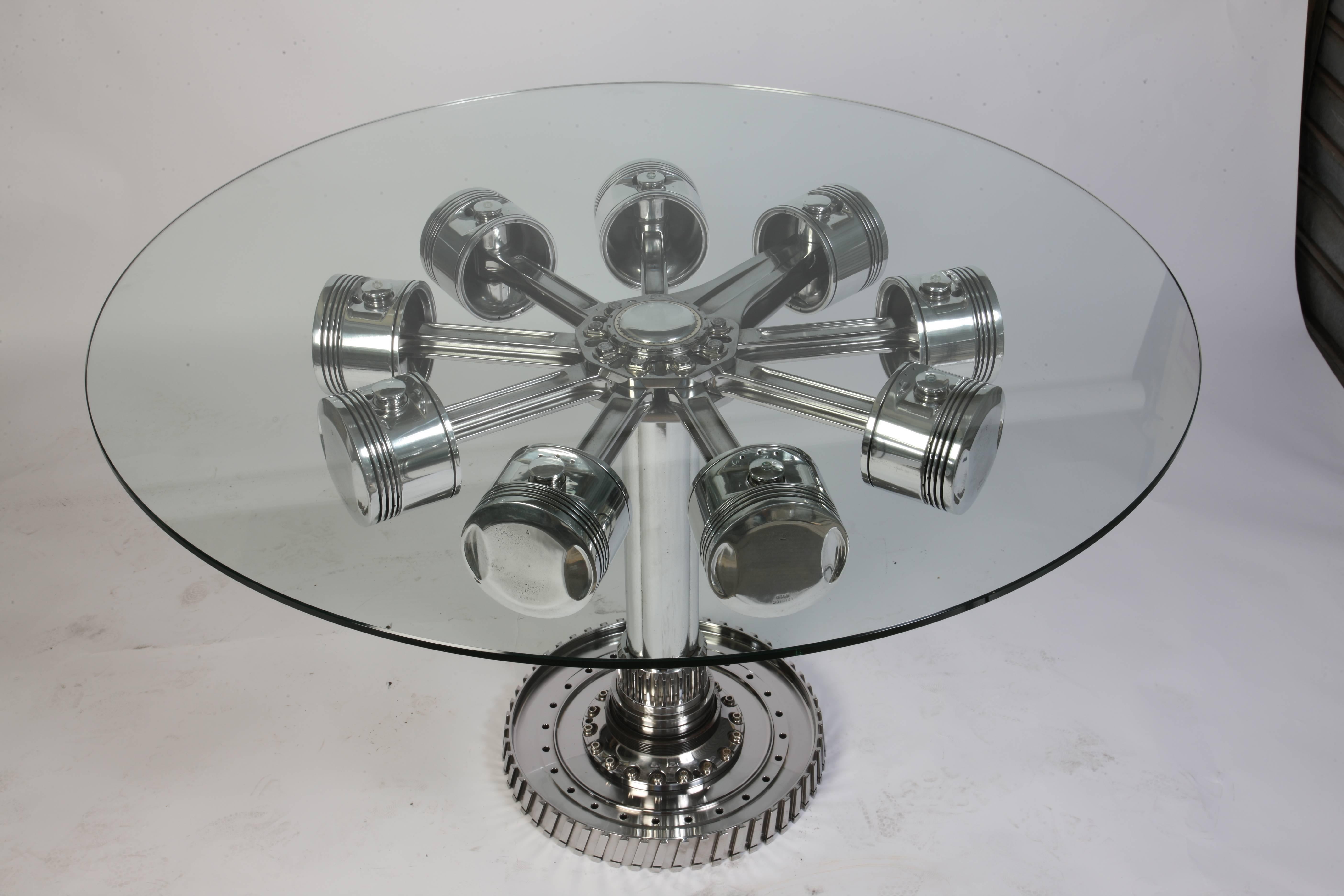 Aviation furniture dining table with radial engine pistons from B17 Flying Fortress engine
AVIATIONSPIRIT by Jean-Pierre Carpentier. Aircraft table, aeronautical furniture, mobilier aeronautic.
Glass top diameter 1m30.
 

+20% VAT for CEE.
