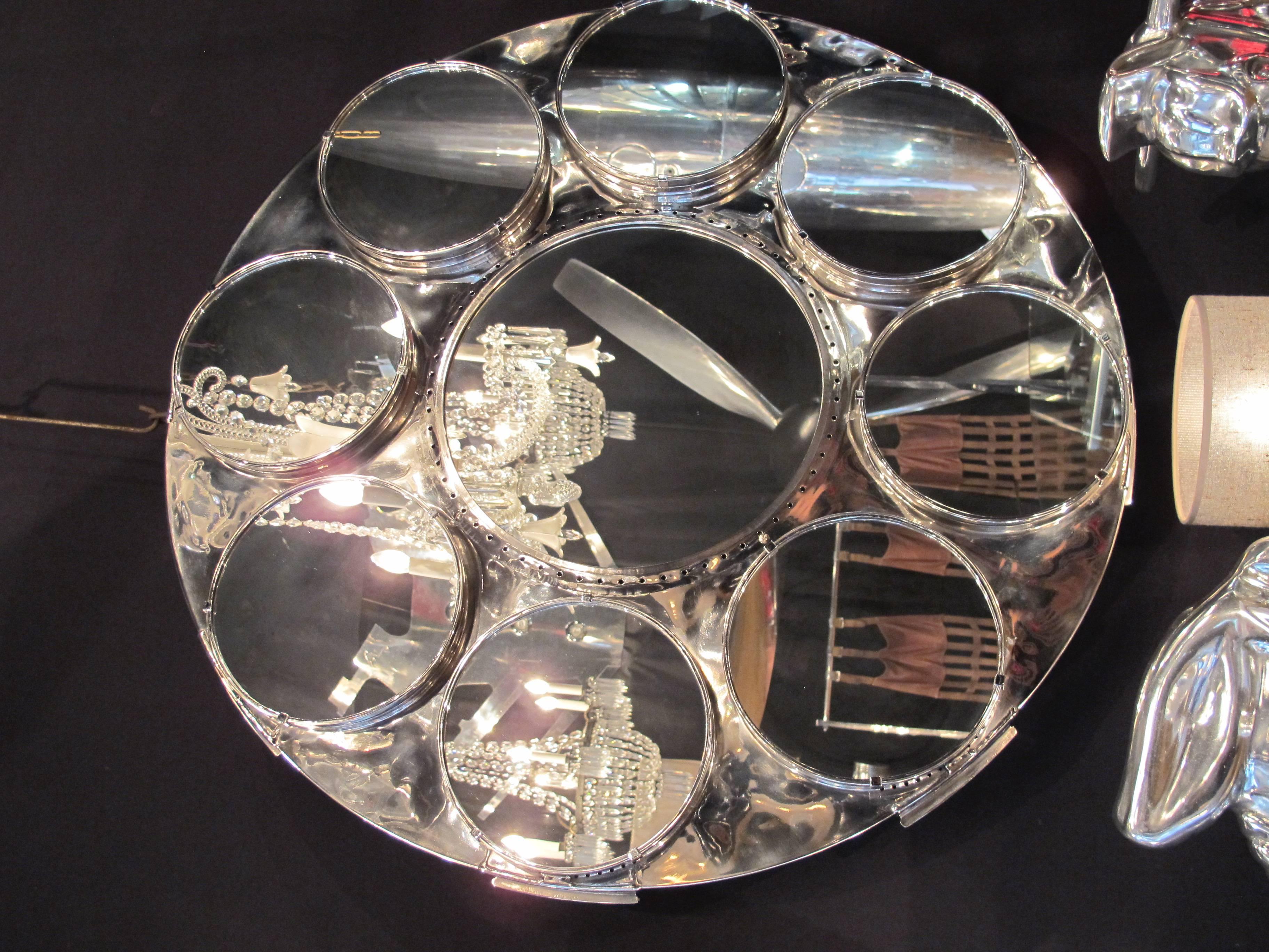 AVIATIONSPIRIT by Jean-Pierre Carpentier
Aviation Furniture, mobilier aviation, aircraft.
Mirror with an aviation combustion chamber holder in titanium
Nine mirrors.


+ 20% VAT for CEE.