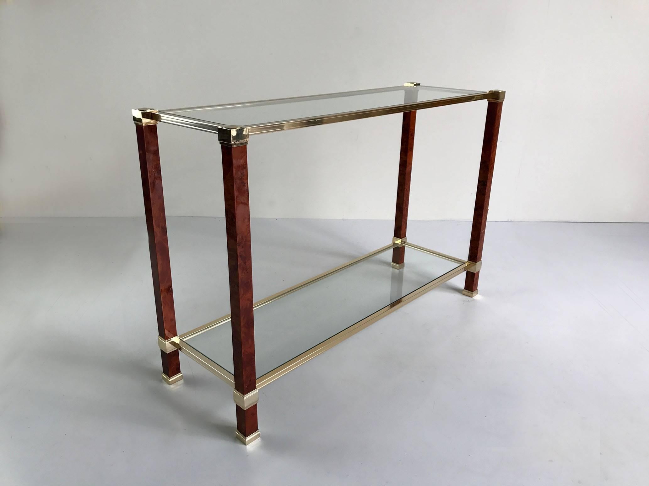 Double-deck console by Pierre Vandel, Paris 1980.
Spotted maple base, gilded metal, glass.
Exceptional state of origin.
signed.
   