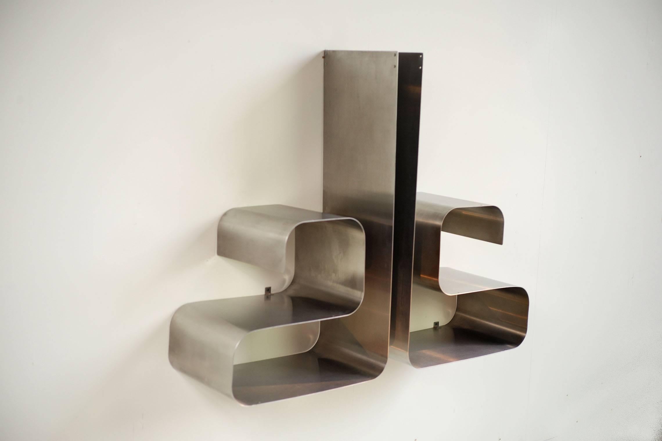 This pair of Zig-Zag shelves was designed by Joelle Ferlande & François Monnet for Kappa in France, circa 1970. They are made from smooth stainless steel frames and can be stood portrait or horizontal.


Bibliography: 