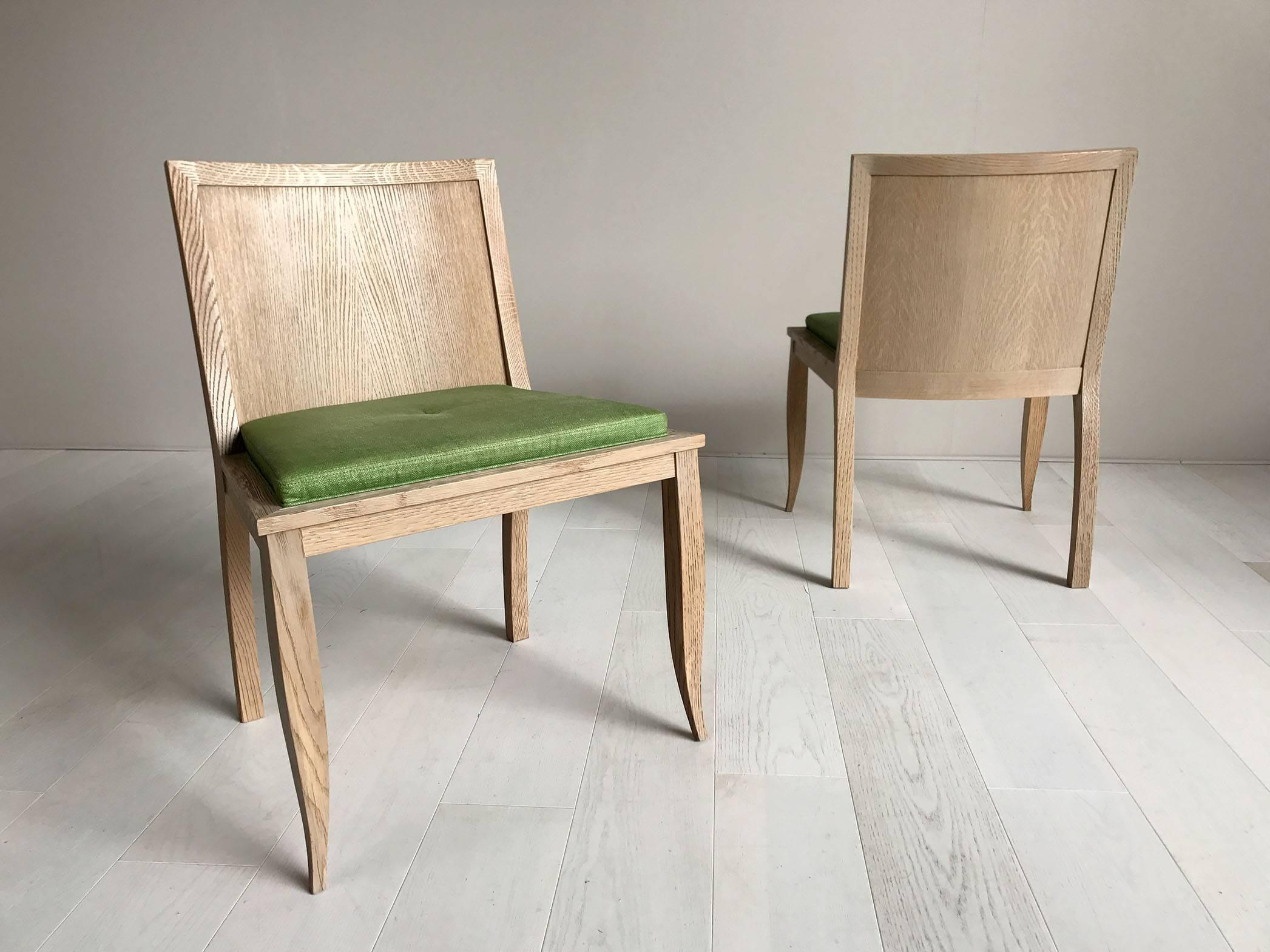 Philippe Delzers for Elitis, pair of chairs L'Ange Bleu, France, 1998.
Structure in bleached oak and sandblasted, seat in green linen. Signed under the seat.
Provenance: Personal collection of Phillipe Delzers.