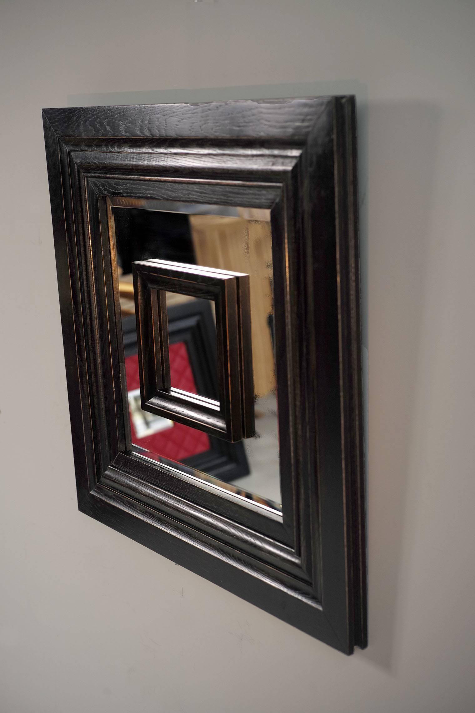 Prototype no 0 of Philippe Delzers' Flamand mirror for Etitis, France 2006
Blackened oak, worn,  beveled mirror.
Perfect condition, from personal collection of Philippe Delzers.
Certificate of authenticity provided..

Phillipe Delzers, after