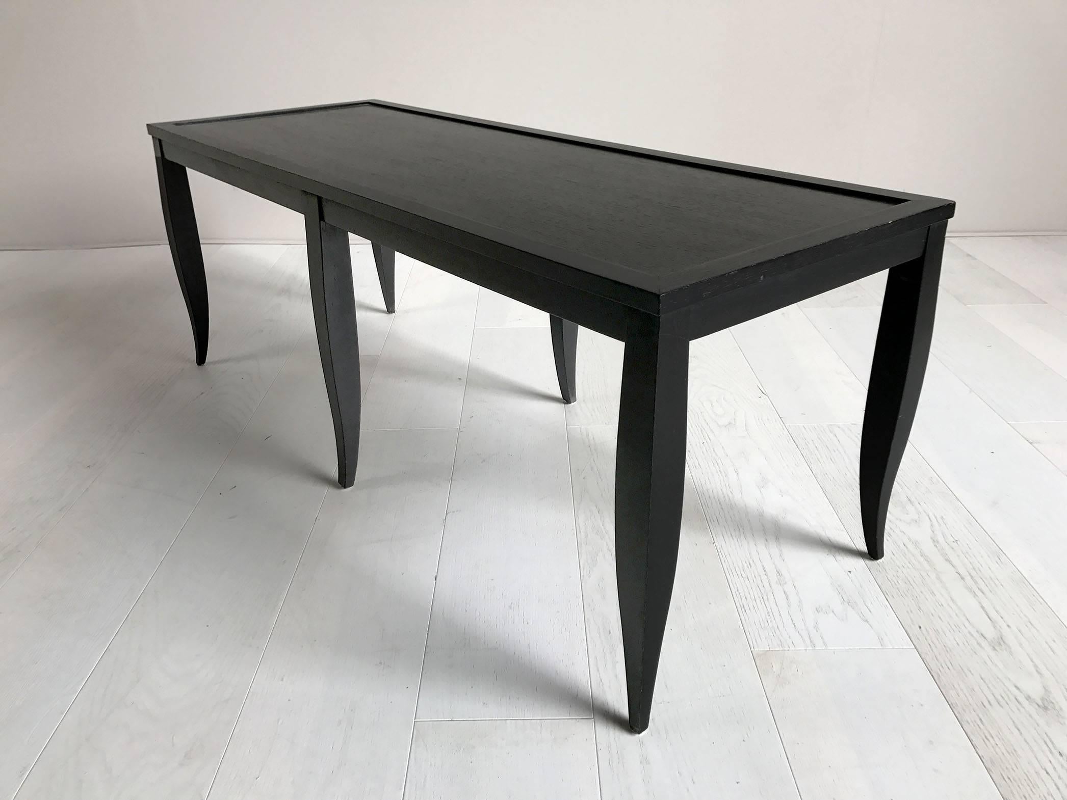 Table/bench with 6 legs in blackened oak Les Amants by Philippe Delzers for Elitis, France, 1998. Exemplary n ° 0, in this version with wooden plate, three benches were published.
Provenance: Personal collection of Philippe Delzers.