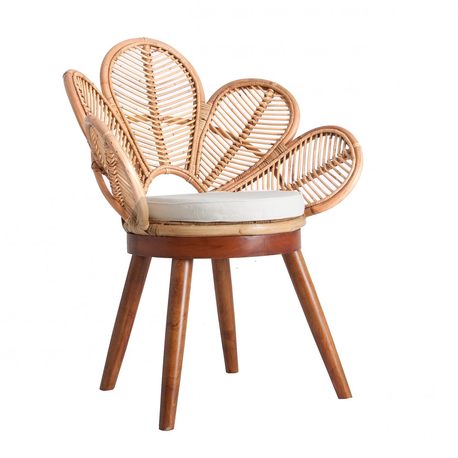 Gorgeous armchair: rattan flower petal shaped seat, on mahogany wooden feet. Perfect on your terrace, in your veranda, around the swimming pool or the dining table. Poetic, elegant, aerial.