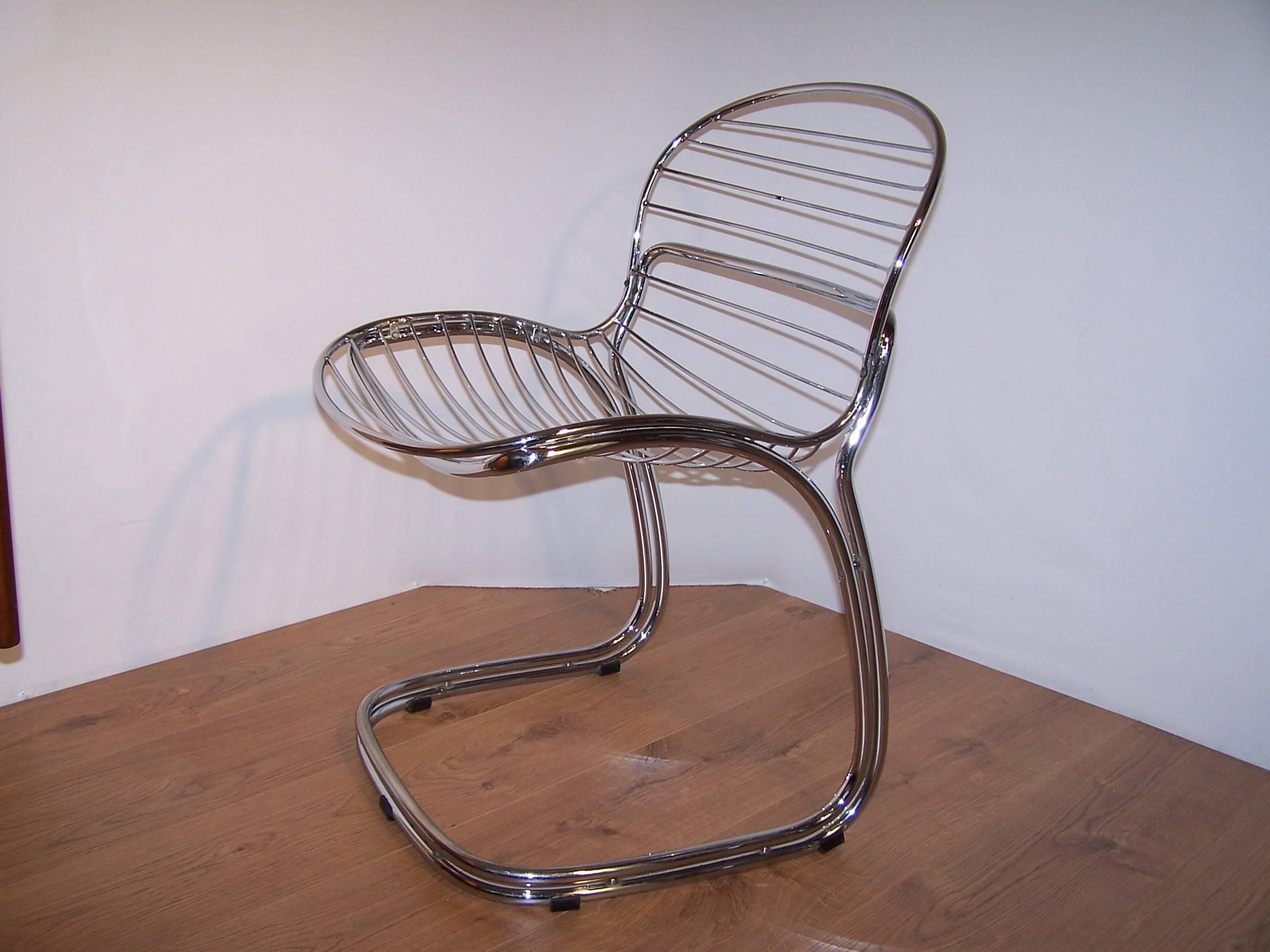 Sabrina chair design by Gastone Rinaldi in the 1970s with chromed tubular structure, in excellent state of conservation.