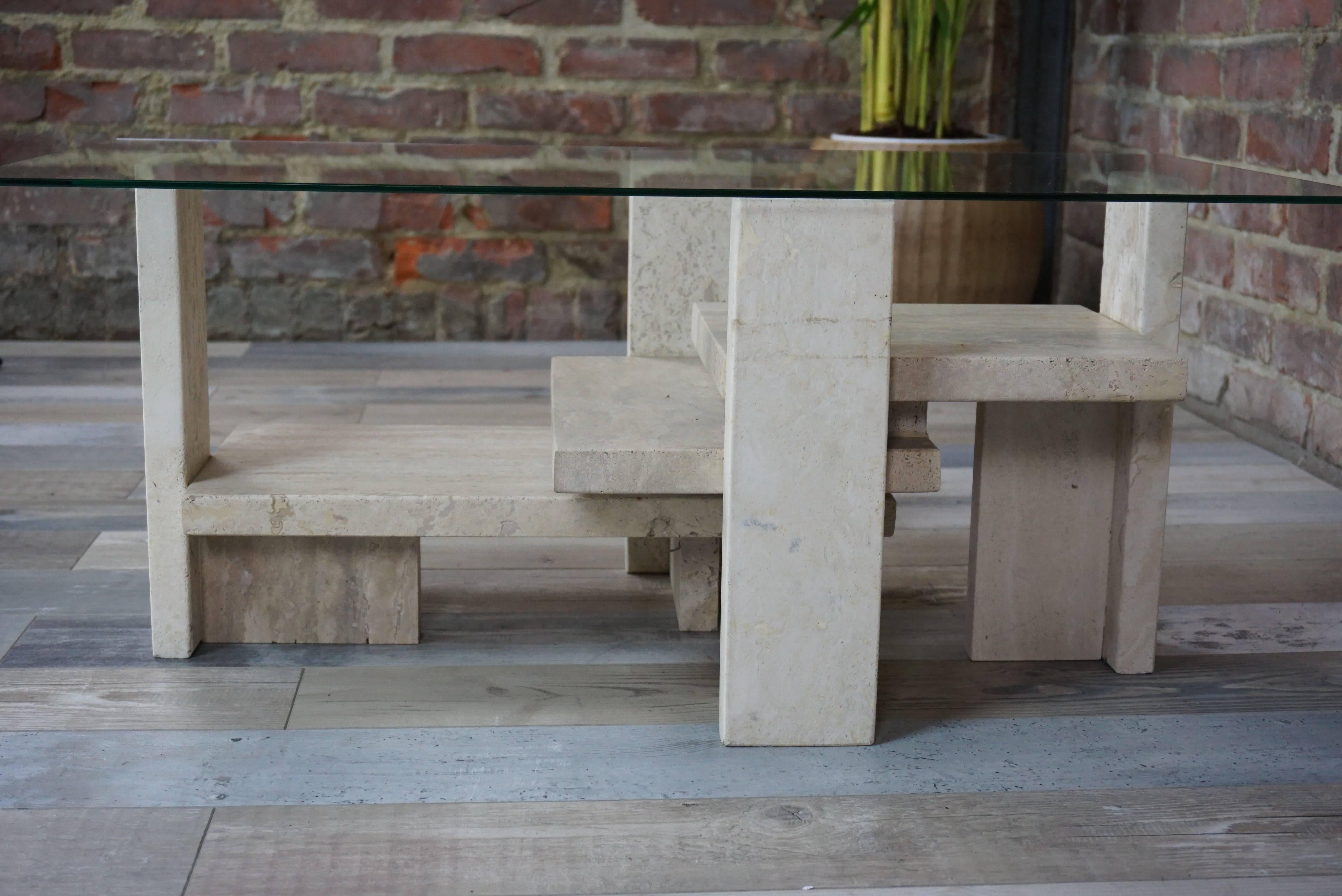 Sculptural, graphic and design, its structure in travertine makes it a true work of art by Willy Ballez.