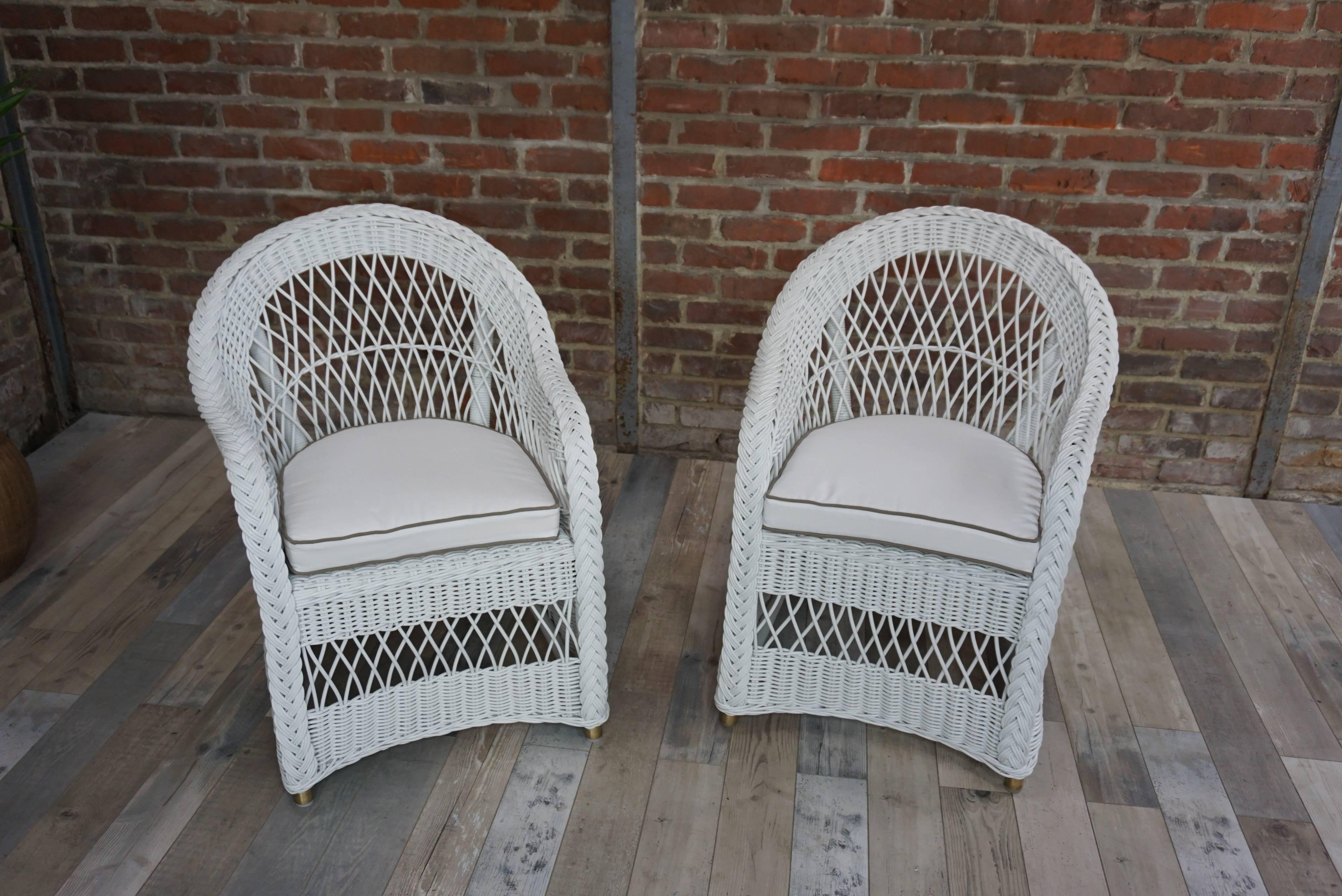 Beautiful and excellent workmanship, these indoor / outdoor armchairs have a look and a timeless design. Great comfort of sitting (cushions indoor / outdoor two colors white / gray taupe provided). Romantic lines all curve, brass cabochon on each