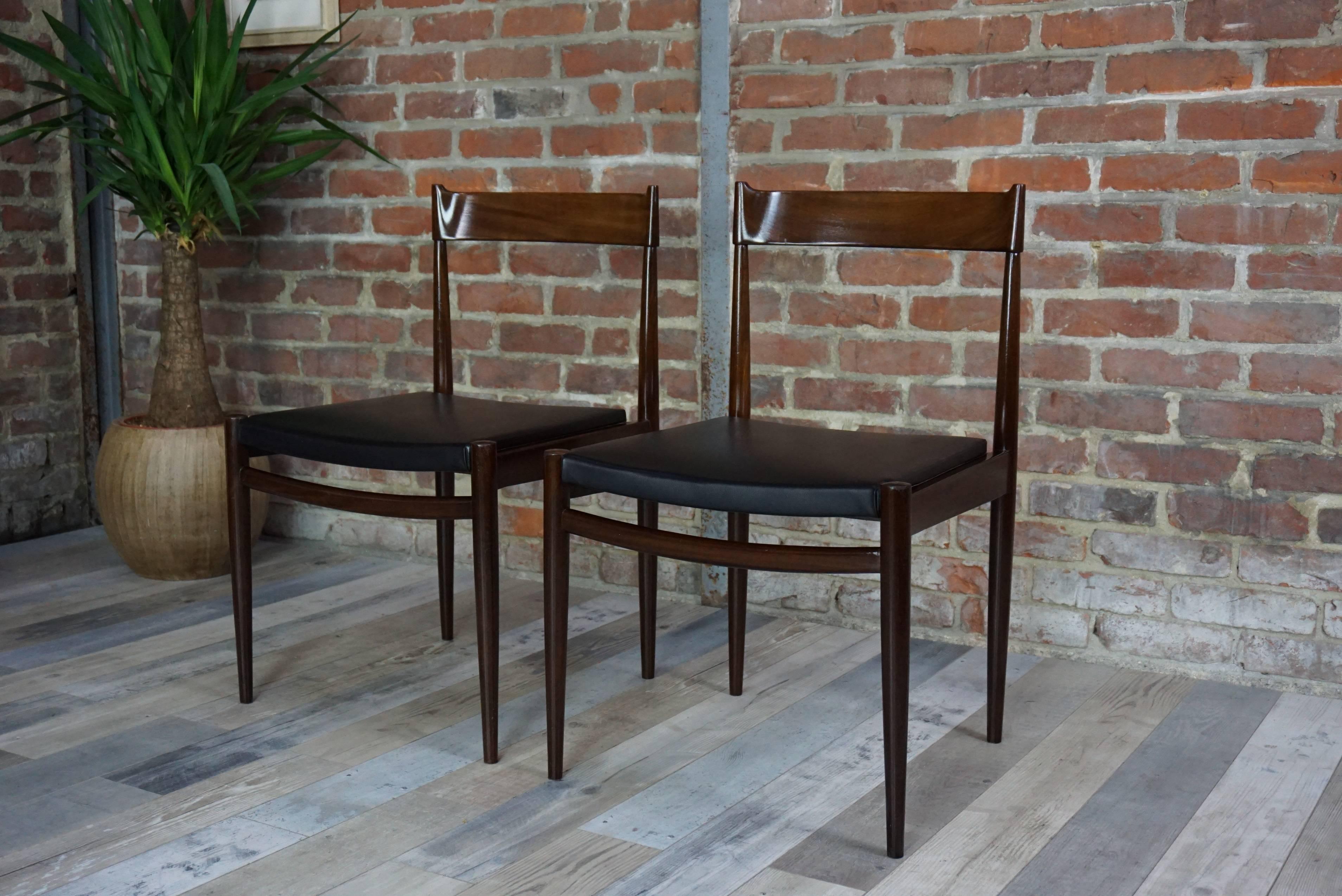 Mid-Century Modern Pair of Teak Chairs and Faux Black Leather Design from the 1950s